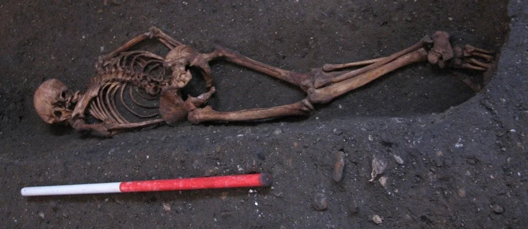 Context 958, found in an unusual face-down burial position
