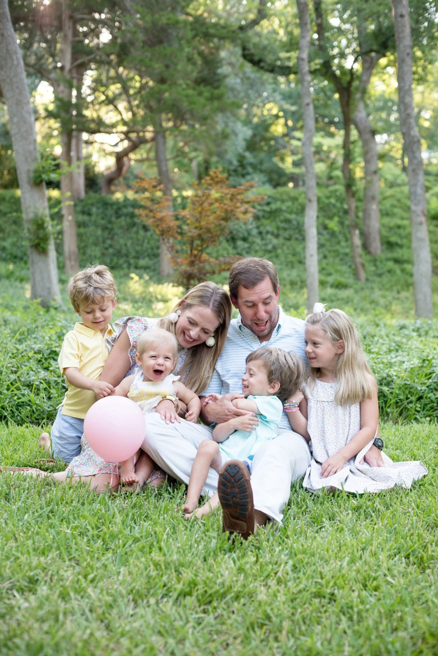 There&rsquo;s always more to the image than what your eyes are first drawn to.

The most precious family, a little tree behind them, a little pink balloon, and little tiny pink ribbons on all their clothes. It&rsquo;s not my story to tell, but thank 
