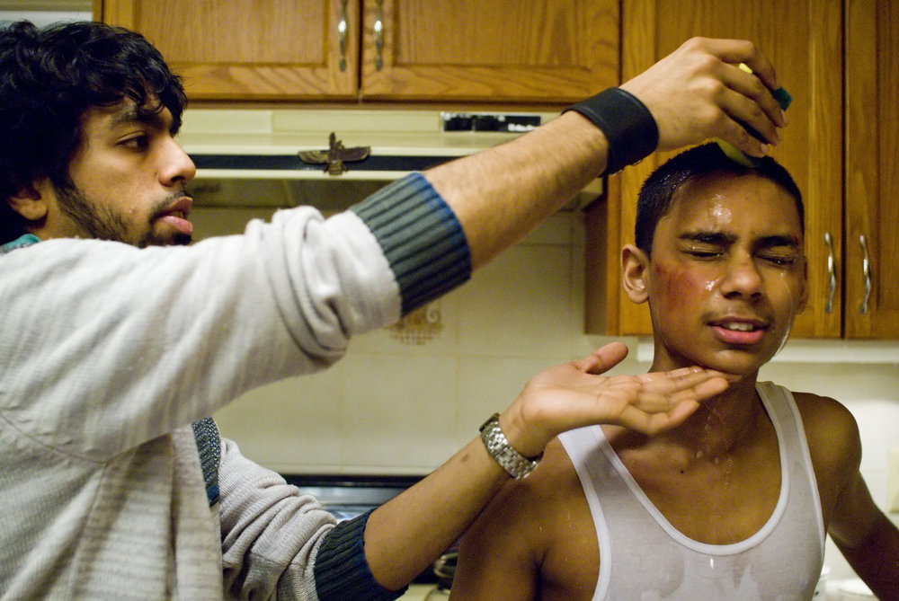  First Assistant Director Darrell Faria and Ryan Persaud on the set of  Karim  (2007). 