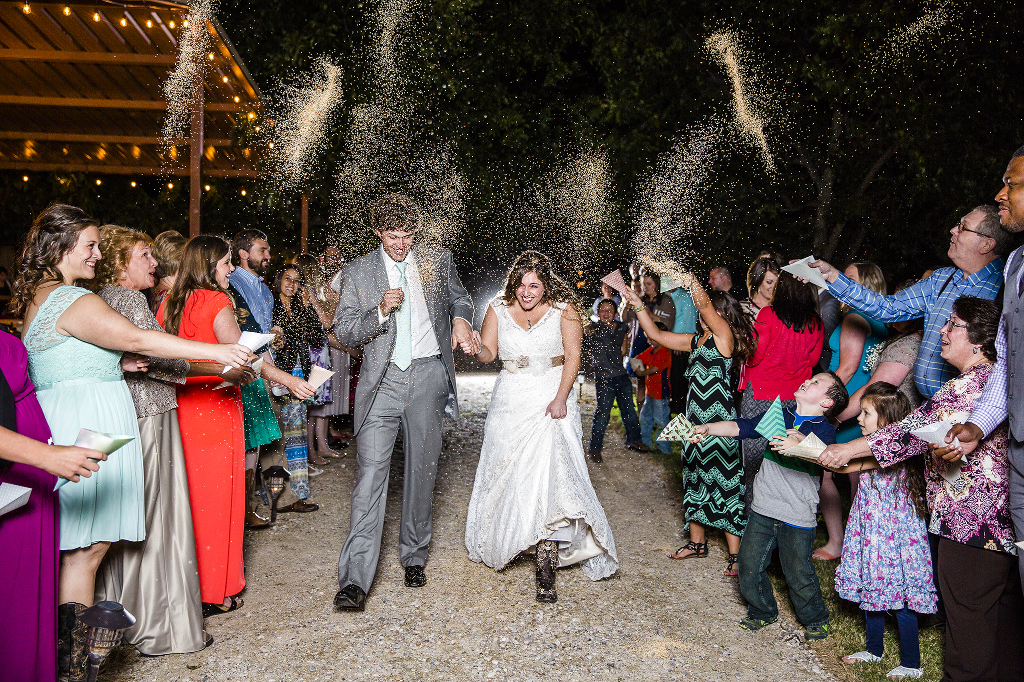 Lubbock Wedding Photography Wedding Photographer Walnut Tree Bride and Groom Exit Birdseed Exit