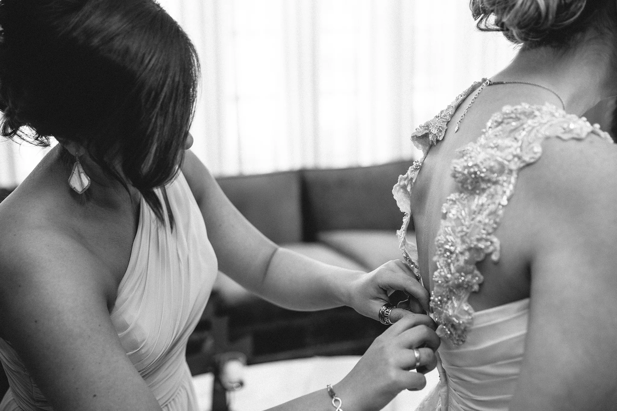 Putting on the dress, wedding dress, bridesmaids