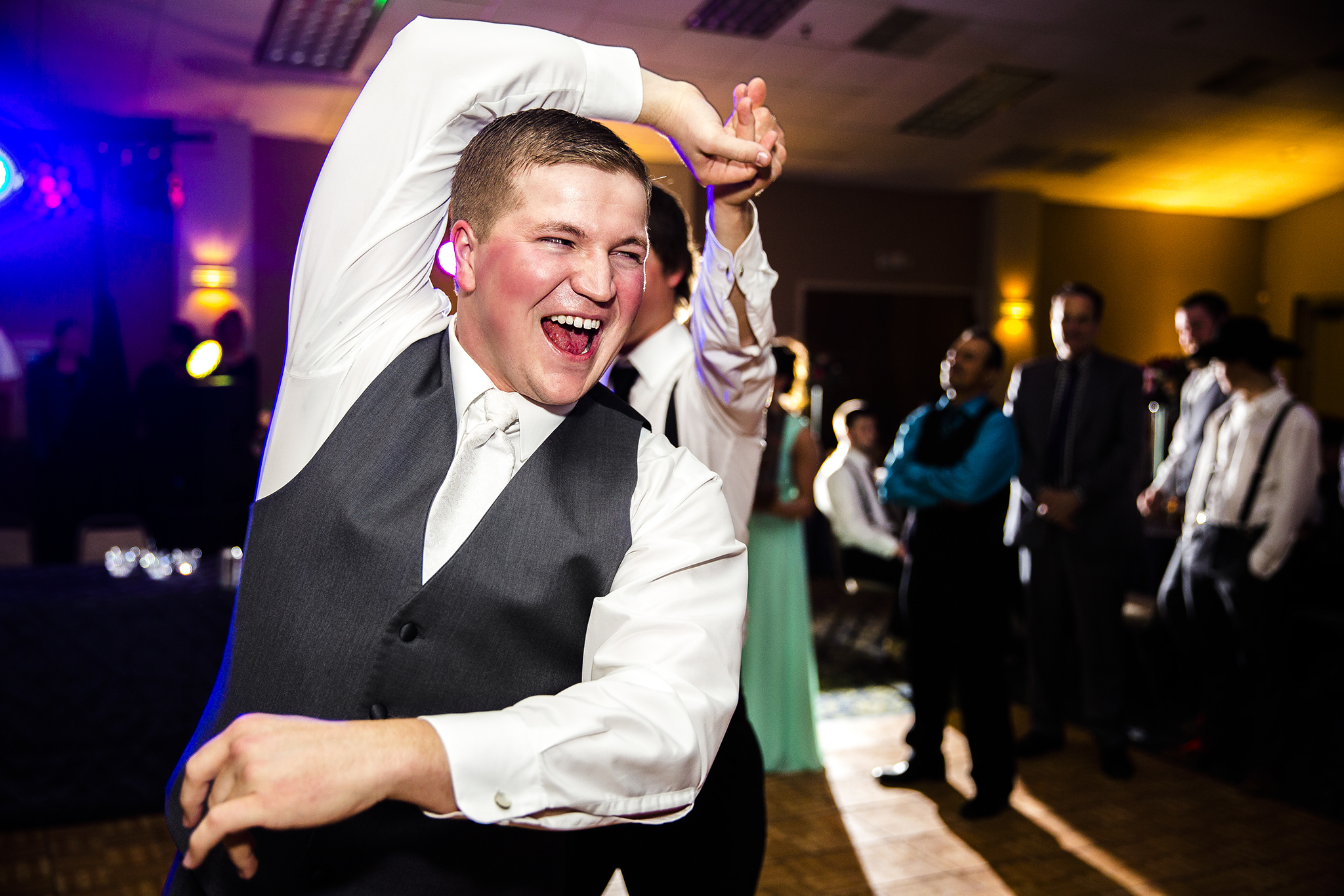 groom, dancing, wedding reception, a little to drink, having fun