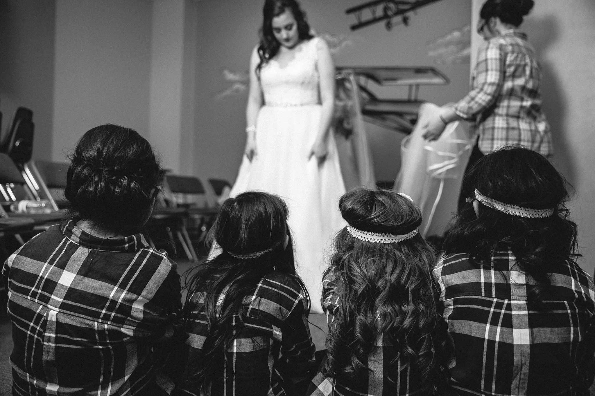 daughters looking at mom in her wedding dress, sweet moment, getting ready for your wedding