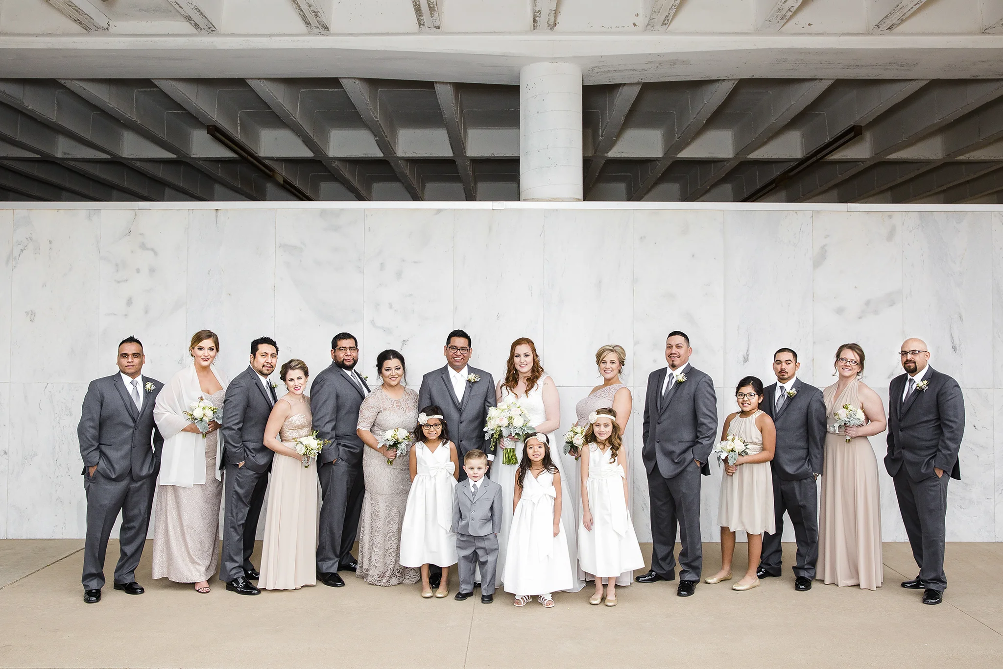 bridal party, wedding day portraits, best serious faces, downtown lubbock texas