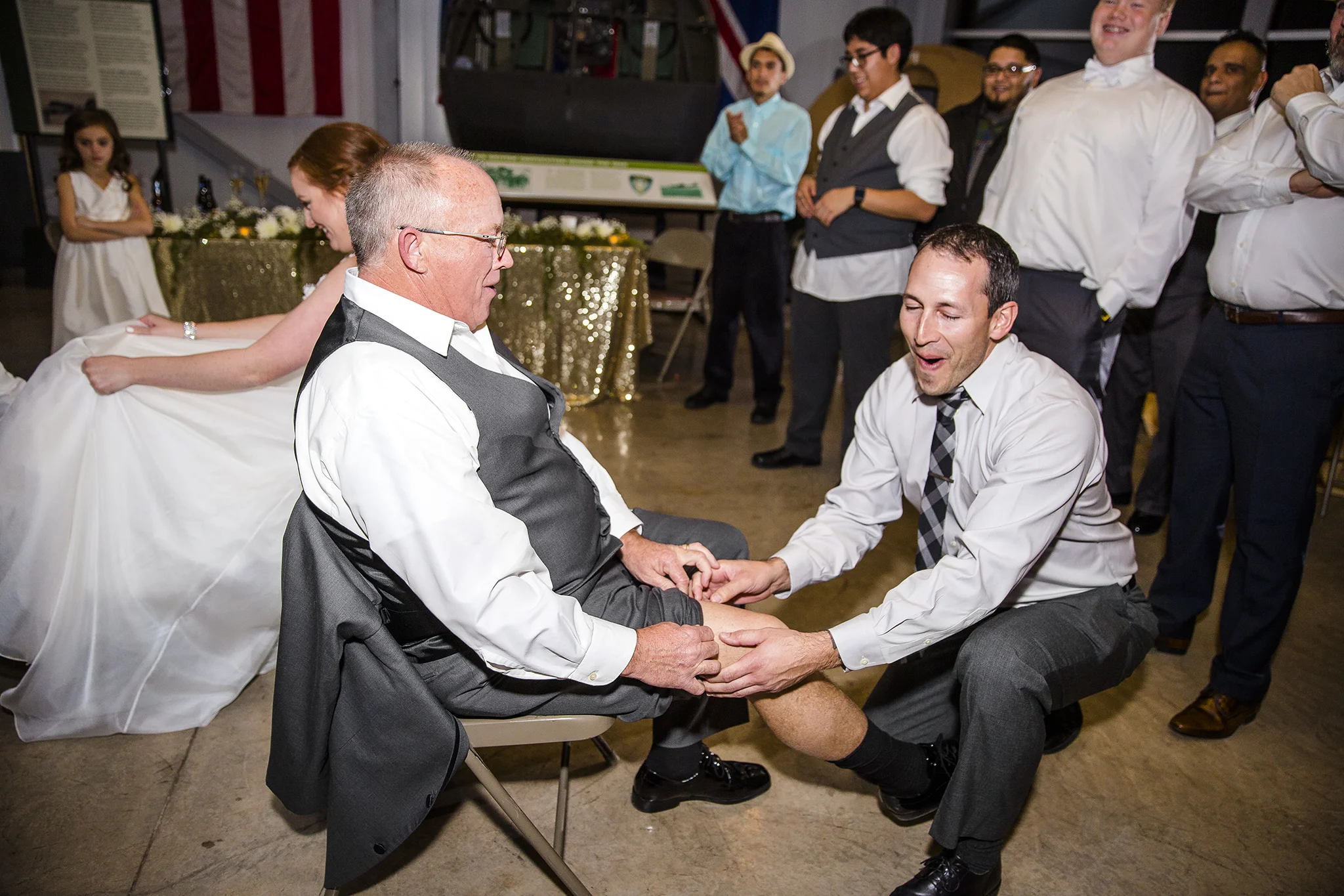 the other garter toss, father of the bride, brother in law, funny moments, fun wedding reception