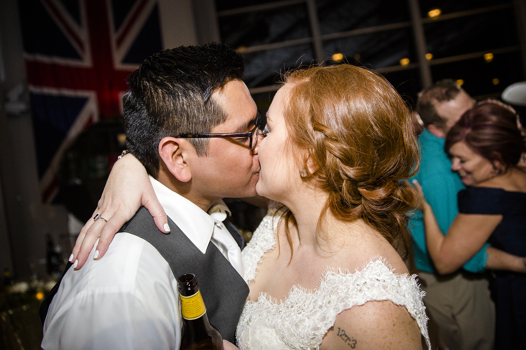bride and groom kiss, wedding reception, romantic, fun wedding reception