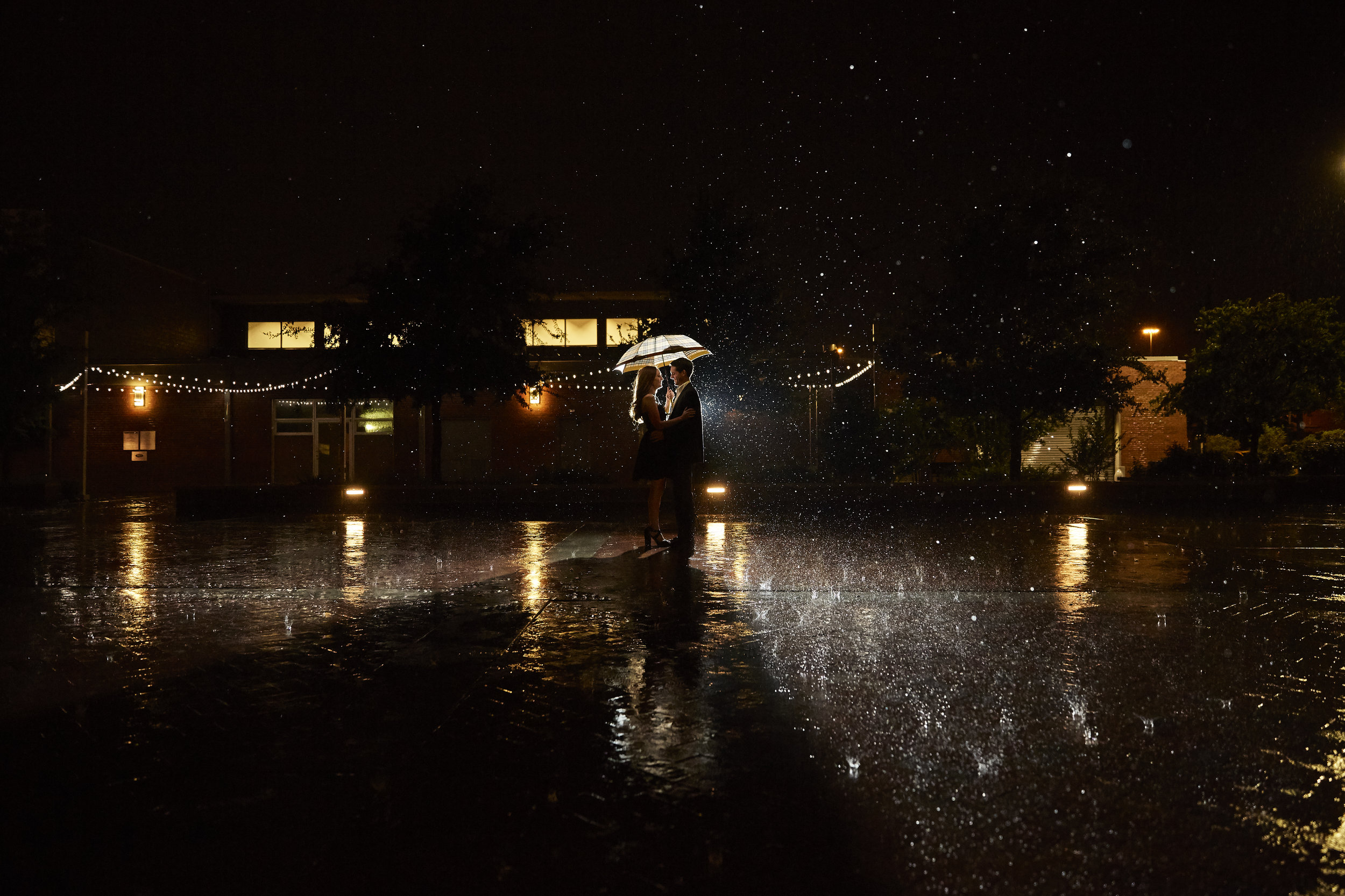 Lubbock wedding photographer, rain pictures, umbrella, reflection, beautiful light, night photography