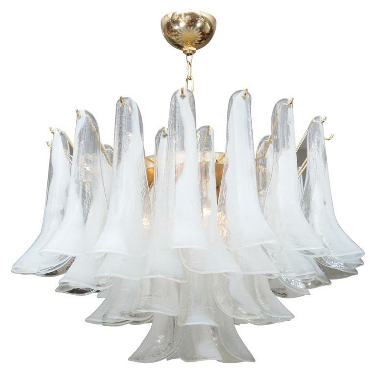 If you didn't know by now, I'm a complete nut for vintage Murano Italian glass! It's a thing of the past (a good thing) and extremely glamorous. I've always been a lover of the Petal leaf chandelier from the 1970's. 