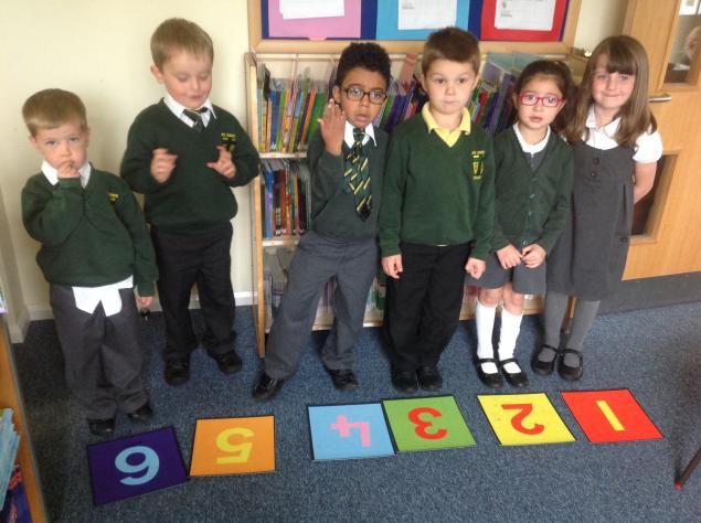  In Maths we have been ordering numerals, matching numbers as words and matching numicon tiles to numerals. 