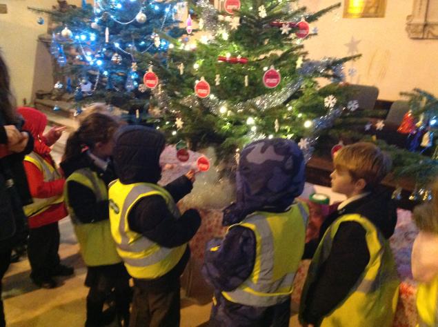  Year 2 visited the Christmas Tree Festival at Otley Parish Church and sang carols. 