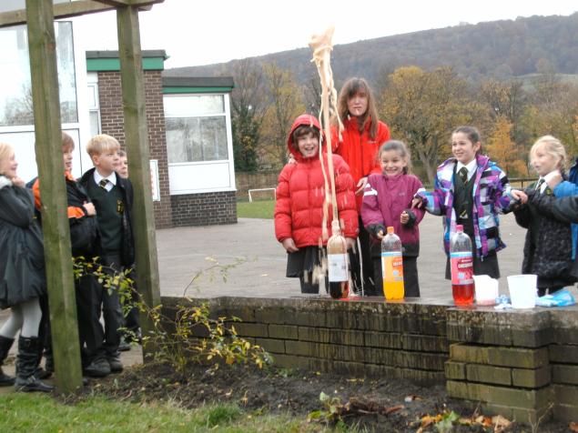  During Science week our class investigated what happened when mentos were added to large bottles of fizzy drinks. We designed fair tests to see which type of fizzy drink produced the largest explosion and also whether the temperature of the fizzy dr