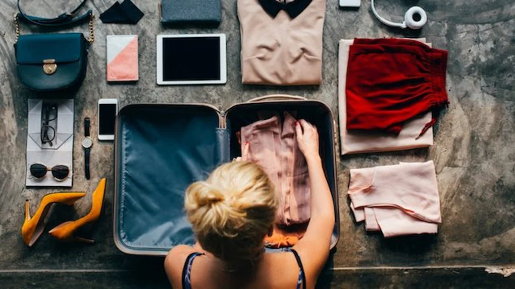 girl-packing-her-suitcase.jpg