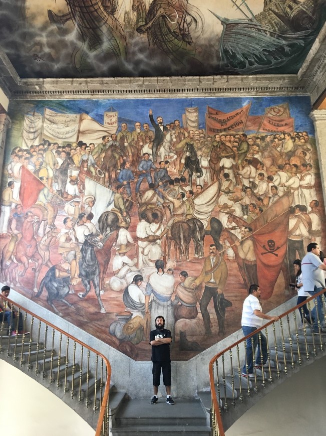 Here is a shortened version of our recent trip to Mexico City, Oaxaca and Havana, Cuba. It was an AMAZING trip where we were able to do SO much within the time we had. We got to see so much history, culture, arts, ate lots of delicious foods and met new friends. Mexico City is like the New York to Mexico. There are so many districts that offer so much to do. We stayed in the downtown Central Area and either walked or used Uber to get around (so cheap!)
Normal
0
false
false
false
EN-US
X-NONE
X-NONE
/* Style Definitions */
table.MsoNormalTable
{mso-style-name:"Table Normal";
mso-tstyle-rowband-size:0;
mso-tstyle-colband-size:0;
mso-style-noshow:yes;
mso-style-priority:99;
mso-style-parent:"";
mso-padding-alt:0in 5.4pt 0in 5.4pt;
mso-para-margin-top:0in;
mso-para-margin-right:0in;
mso-para-margin-bottom:8.0pt;
mso-para-margin-left:0in;
line-height:107%;
mso-pagination:widow-orphan;
font-size:11.0pt;
font-family:"Calibri",sans-serif;
mso-ascii-font-family:Calibri;
mso-ascii-theme-font:minor-latin;
mso-hansi-font-family:Calibri;
mso-hansi-theme-font:minor-latin;}
Carlos in front of a Diego Rivera mural within the Chapultepec Castle. …formerly an imperial palace and presidential residence. Today, the Castle houses the country’s National History Museum. There are a ton of original paintings, artifacts on view throughout the Castle.