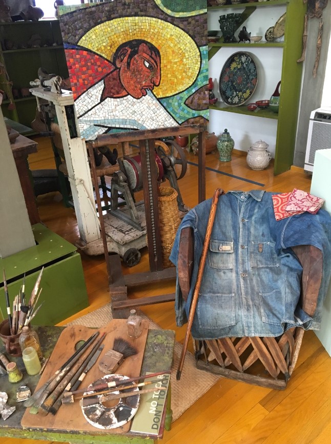 Diego Rivera’s personal items in his studio and one of his pieces