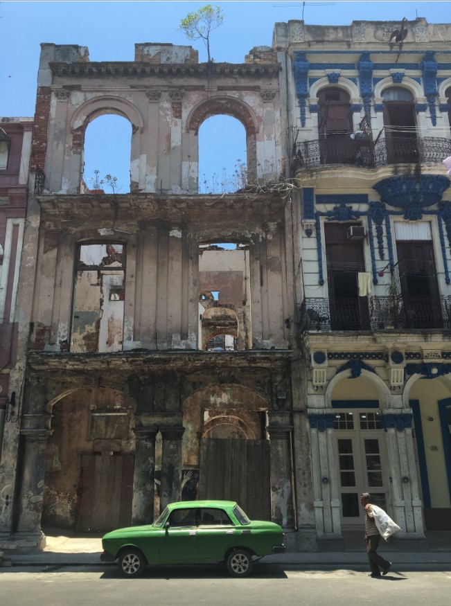 More cars and old buildings of Havana. There is so much character to these old buildings that live within the city. One of the main reasons we wanted to do this trip as soon as we could was because we wanted to SEE Cuba before it “changes” Eventually the doors for Americans to travel to Cuba will be wide open….with that includes corporations. How will this change Cuba? I’m sure the next time we visit, there will be a Starbucks or a McDonalds planted there. The one thing about my trip to Cuba was that we really enjoyed being “off the radar” from internet, phones, texting, social media, tv, commercials… As we walked the neighborhoods, you actually saw kids playing and people hanging out enjoying the scenery and talking with friends/family. Not connected to their phones or computers.