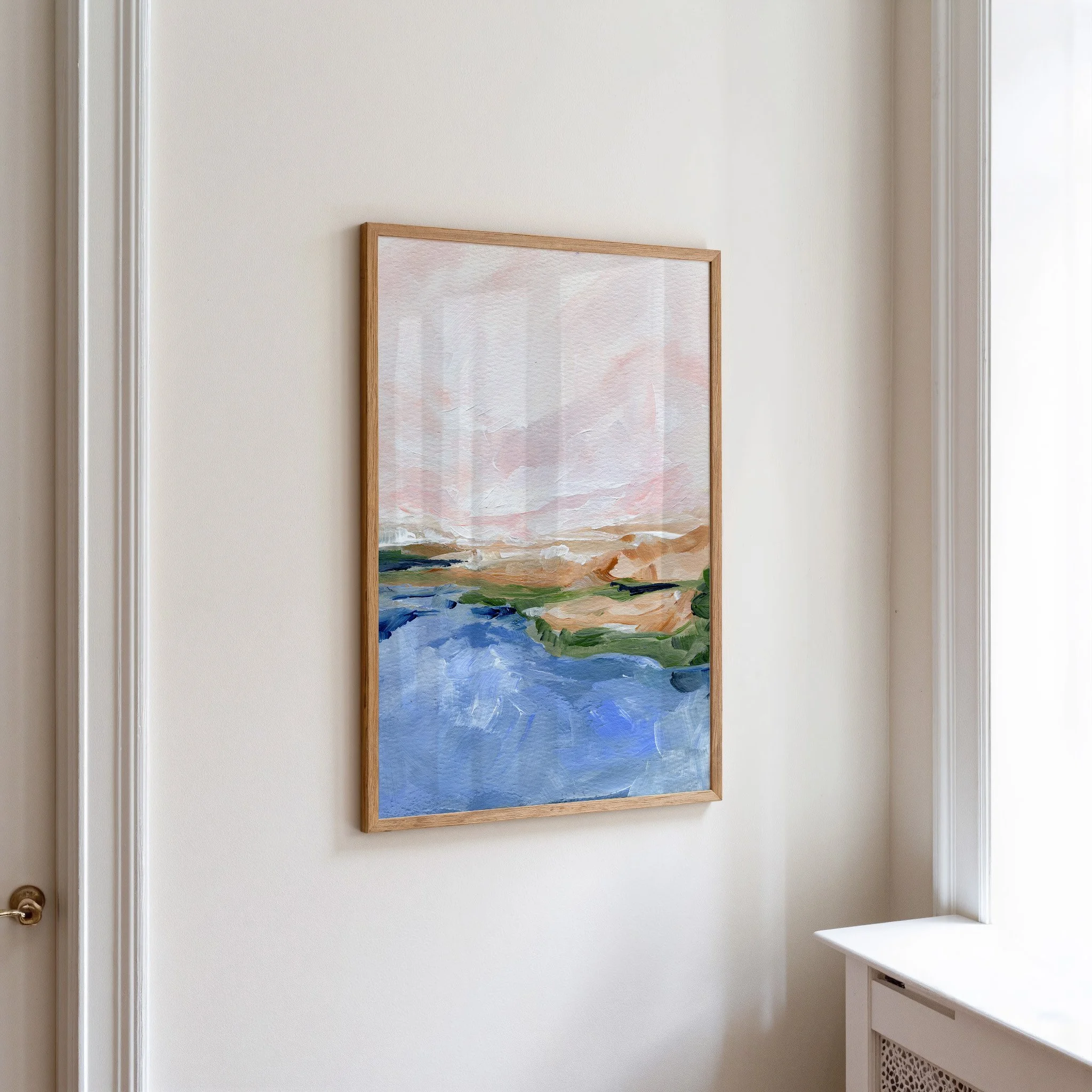 Coastal landscape art print with soft pink sky and ocean blue tones, calm modern wall decor. Art by Kendra Castillo, Bellingham Washington Artist