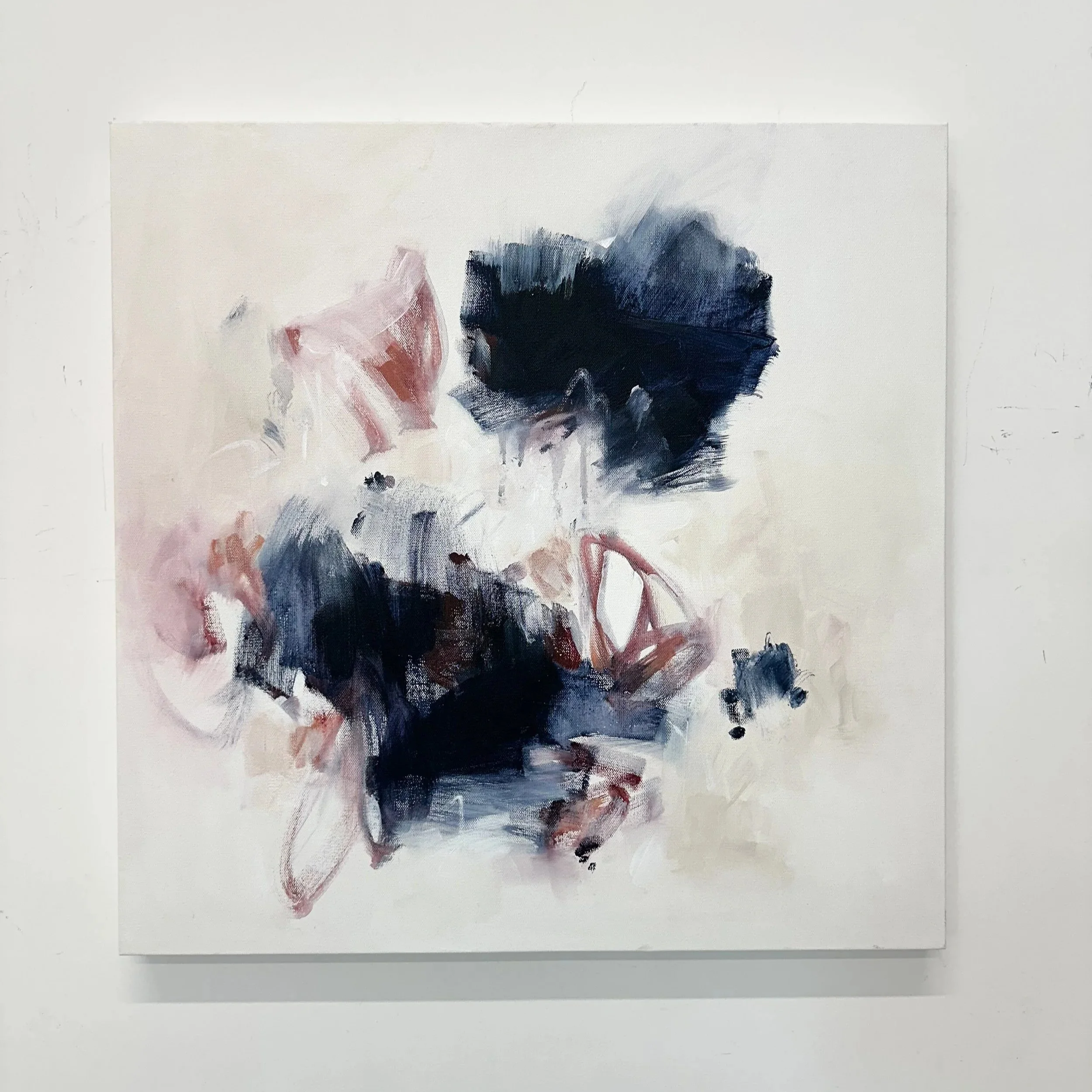 Original abstract painting titled Hearts Intertwined by Bellingham artist Kendra Castillo, featuring soft blush, navy, cream, and white acrylic brushstrokes on canvas.