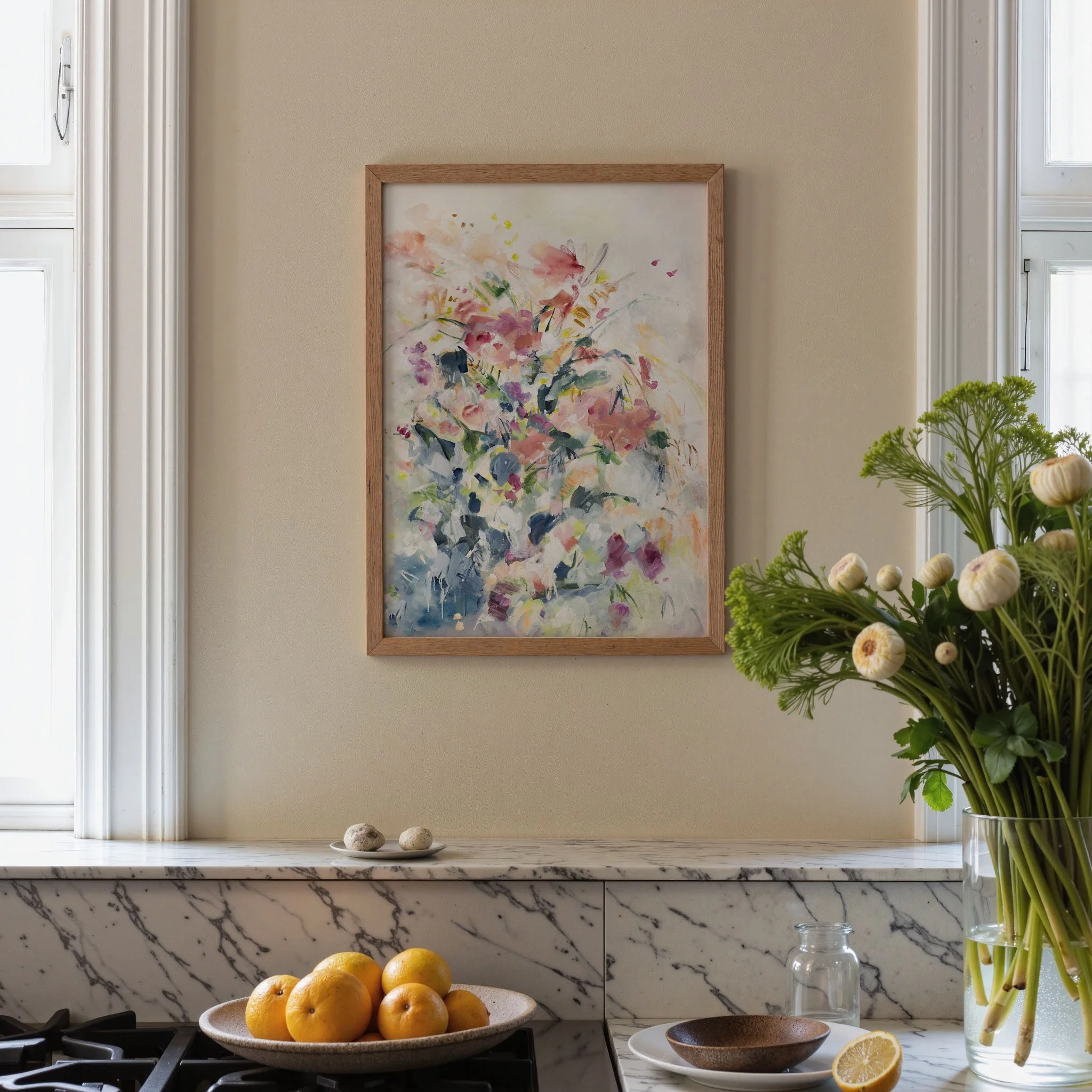 Framed Still Garden colorful floral print by Kendra Castillo displayed in a bright living room with natural light.
