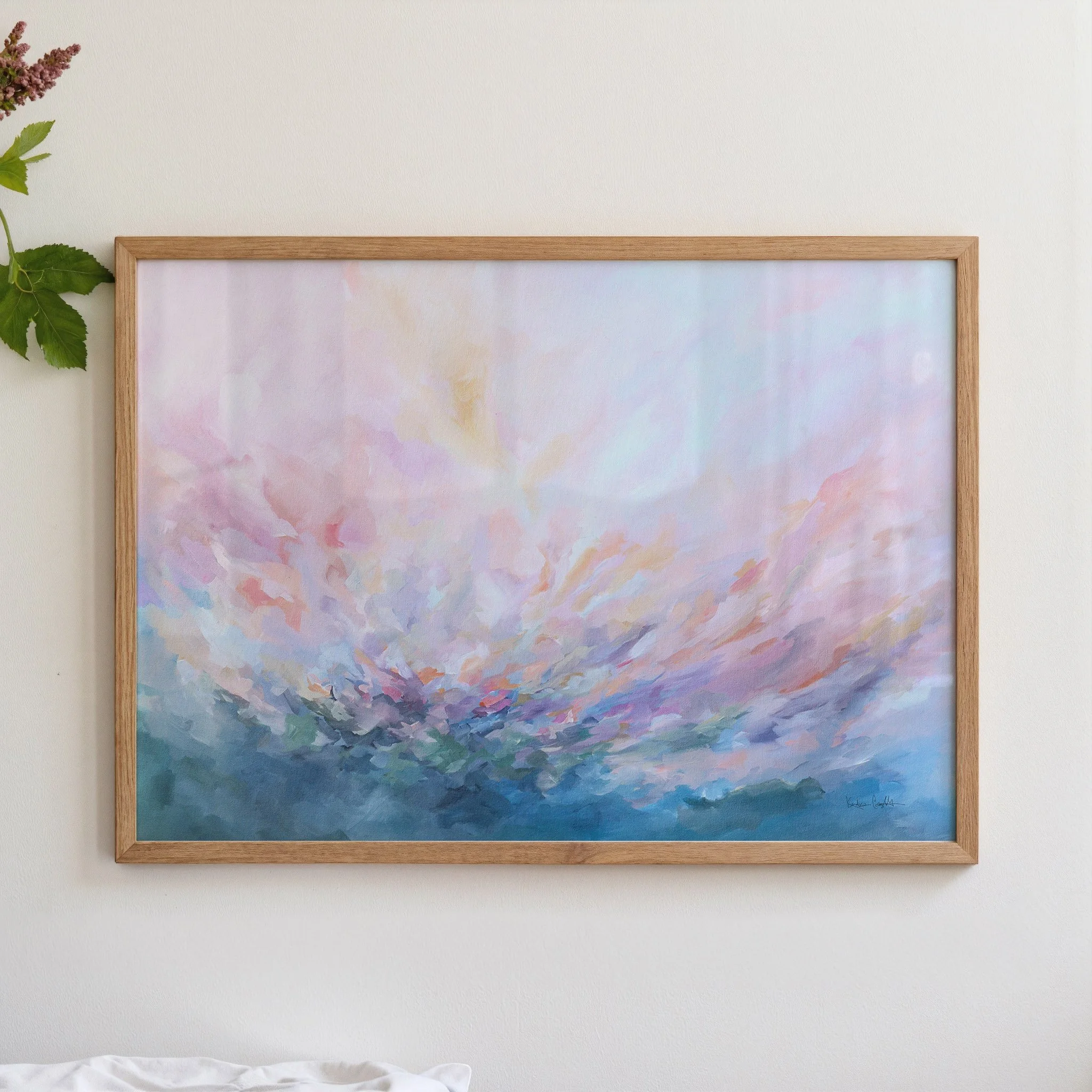 Abstract painting with a burst of pink, purple, and blue colors. The painting has a soft, dreamy feel and is perfect for adding a touch of color to any room. Horizontal art print by Kendra Castillo