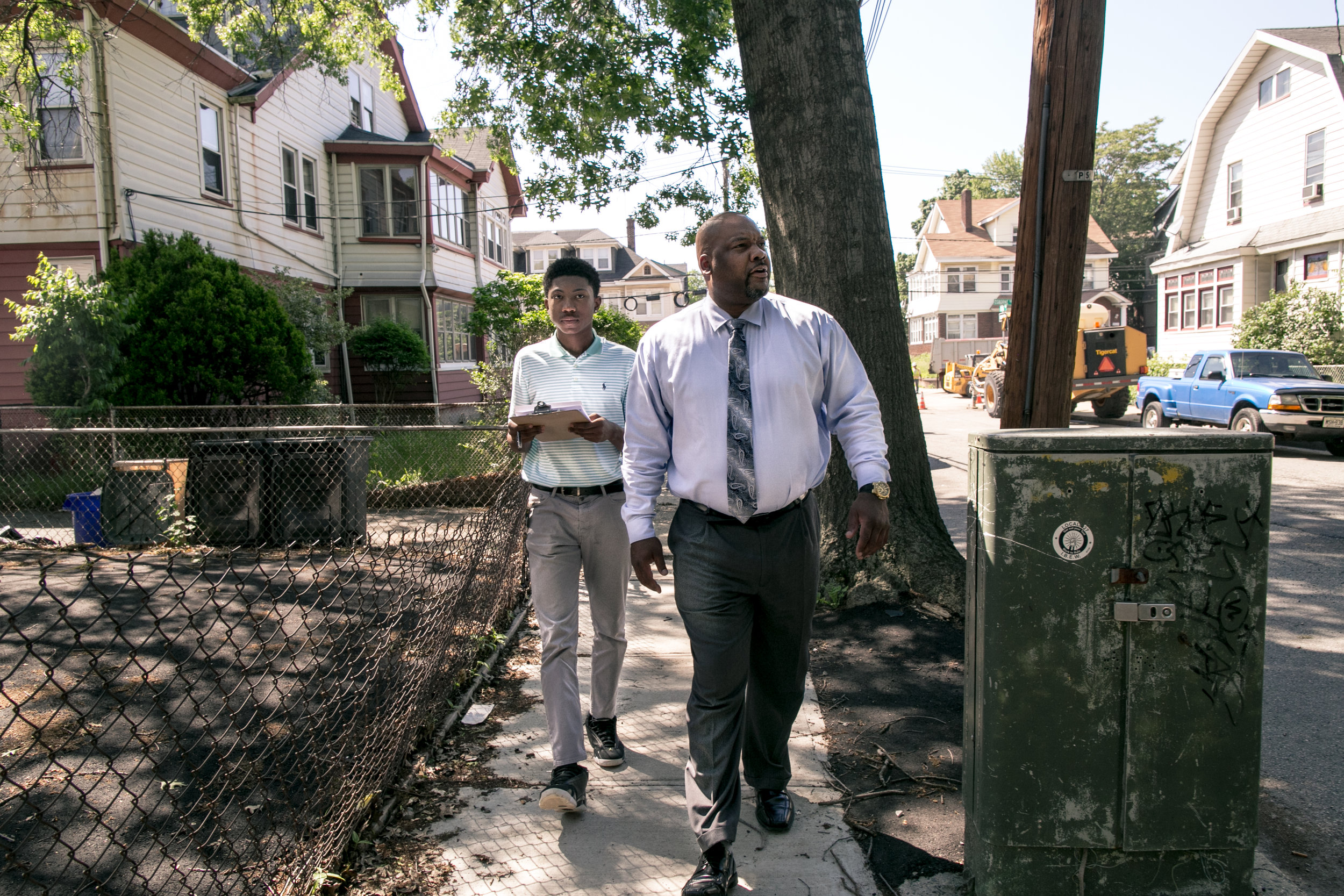 CES Deputy Director Ebin Draper field trains Newark Success Mentor Jaleel McCauley on how to conduct home visits