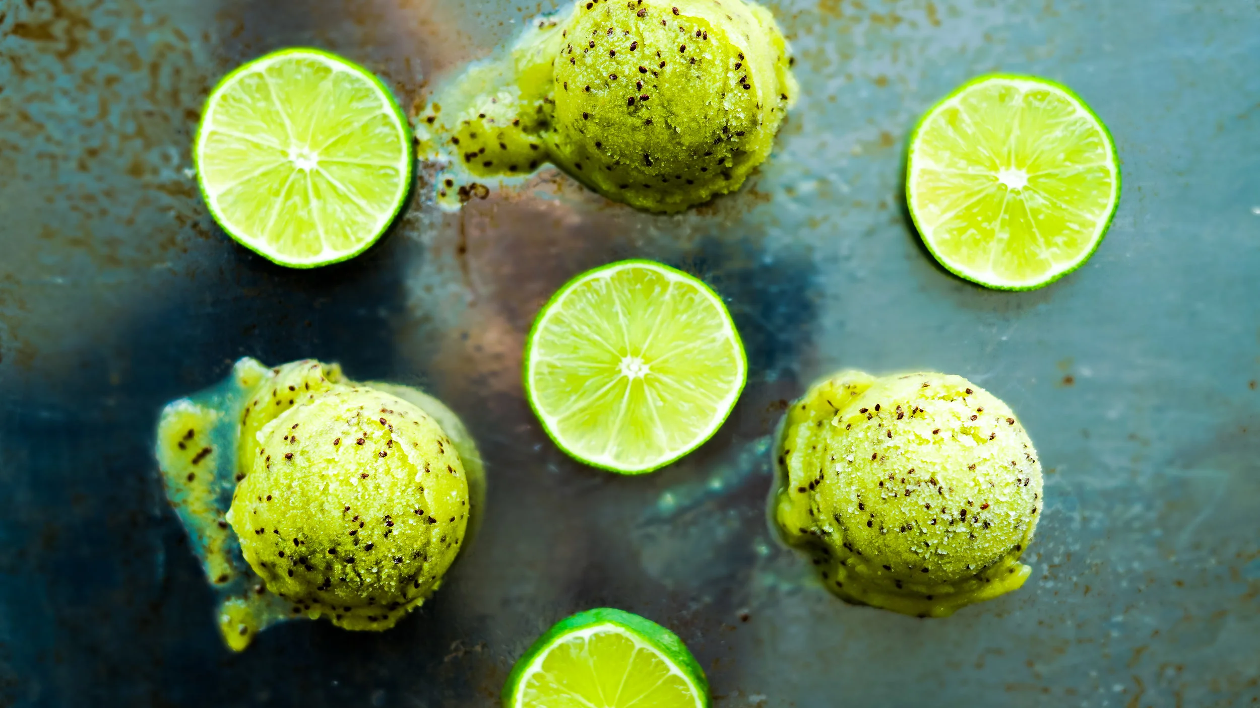I bought an ice cream/sorbet maker back in September and tucked it away in the back of my cabinet for the summer. Now that the weather is FINALLY nice enough (and I had a ton of kiwis, I mean a ton, leftover from a shoot) I decided to bring out the ice cream machine and given it a try.