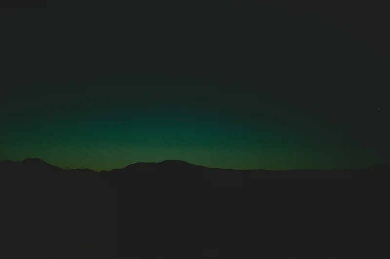 sunset view mountain with green sky