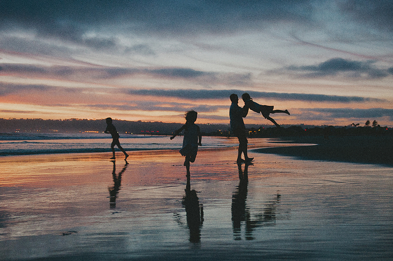 family pictures on beach in Southern California at sunset