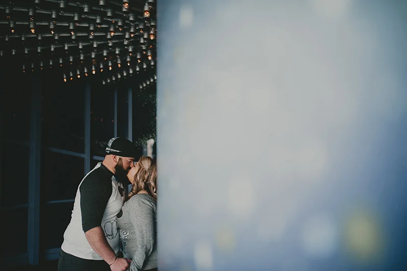 Couple kissing in front of animation building at disneyland california adventure park