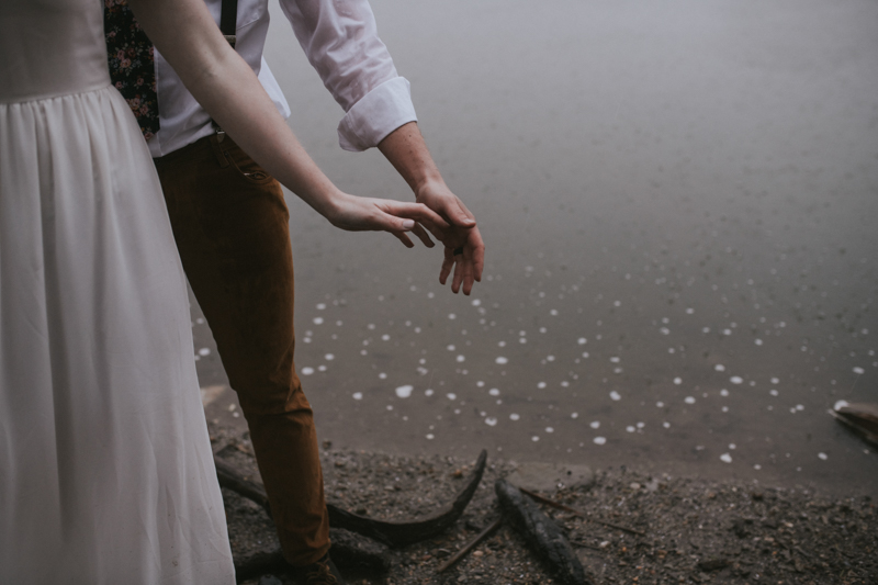 Close up of couple holding hands