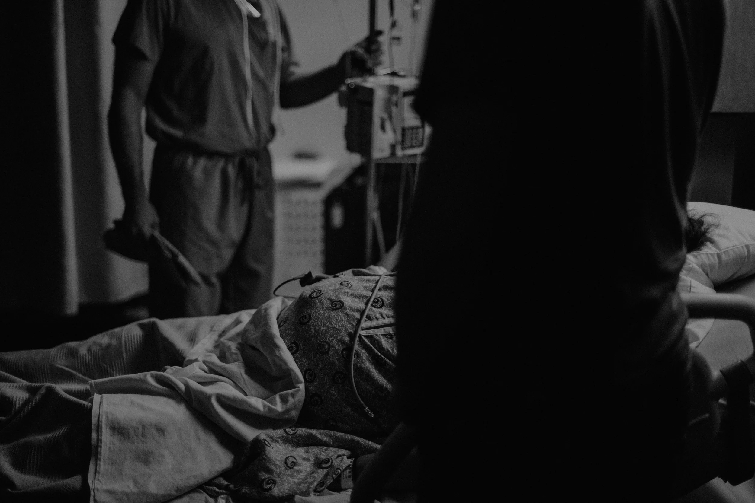 mom in hospital bed labor and delivery