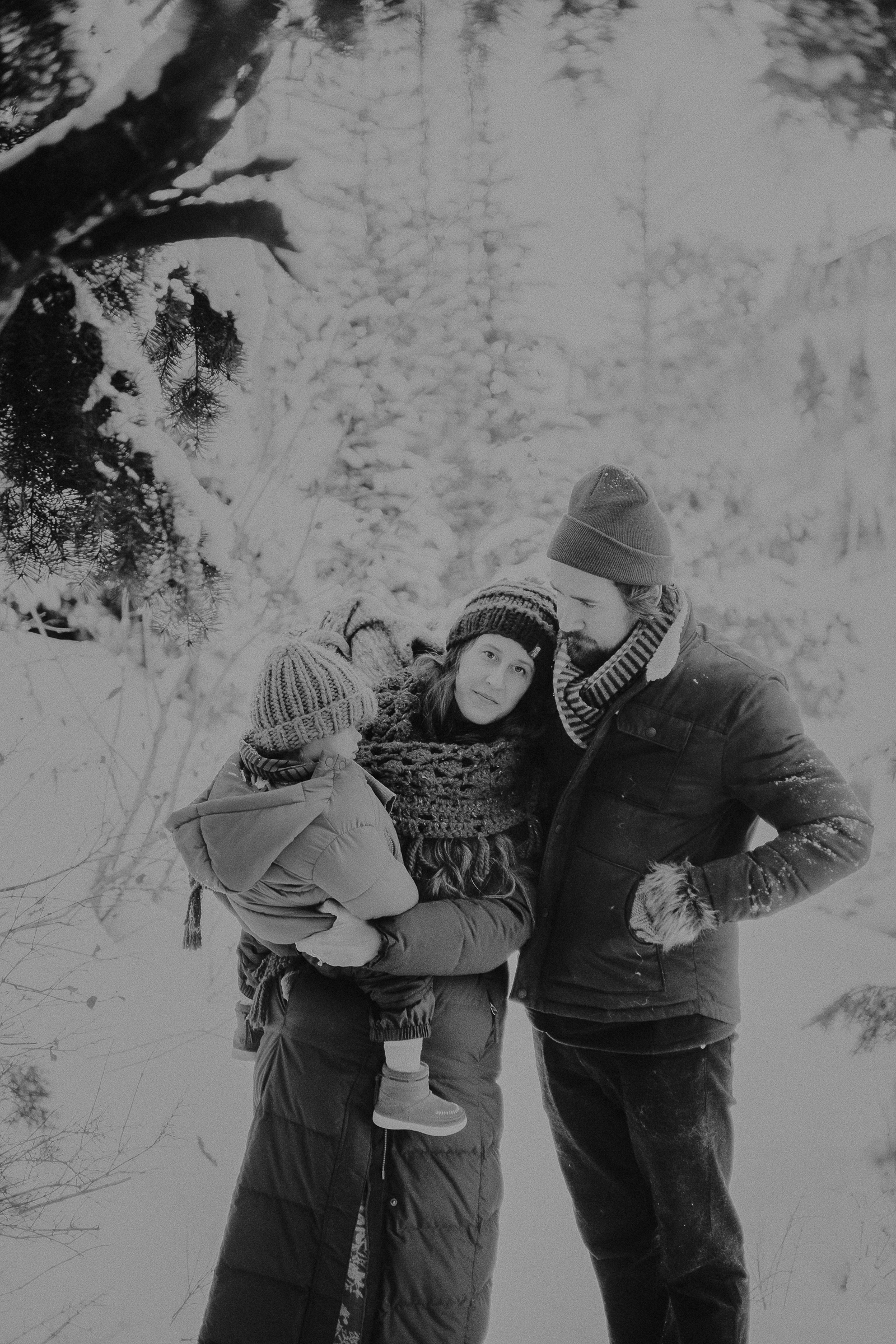 Family picture in snowy mountains 