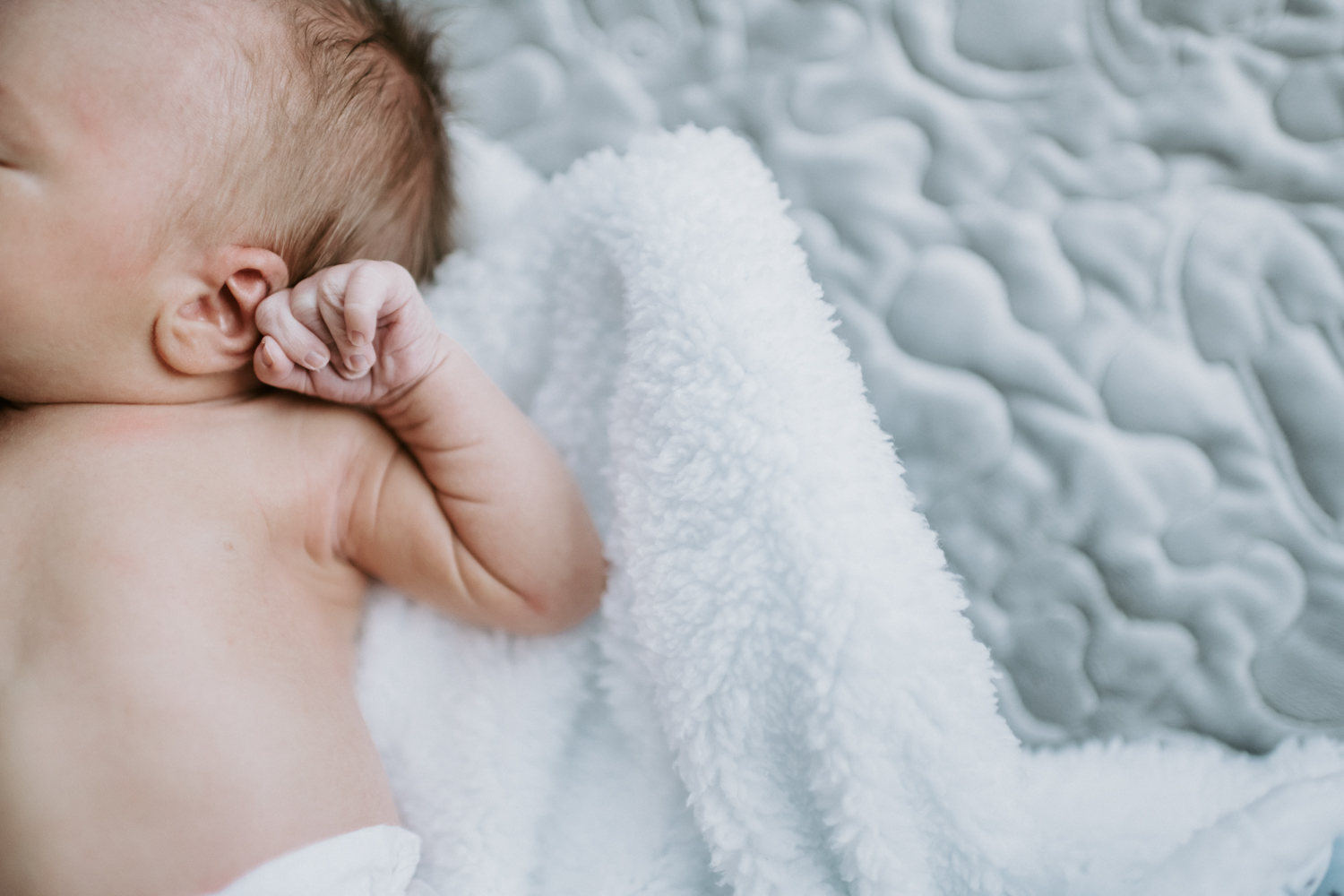 newborn baby boy ear and hand details