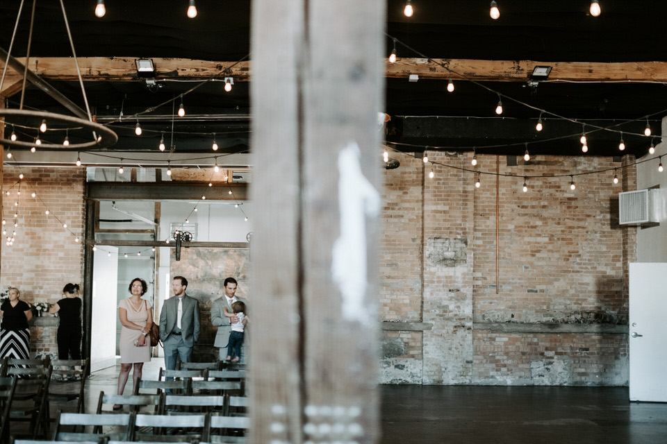 industrial wedding venue with guests
