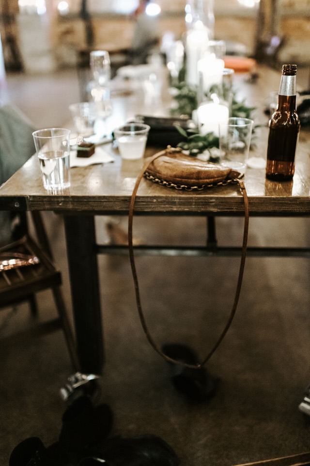 purse sitting on table at wedding reception