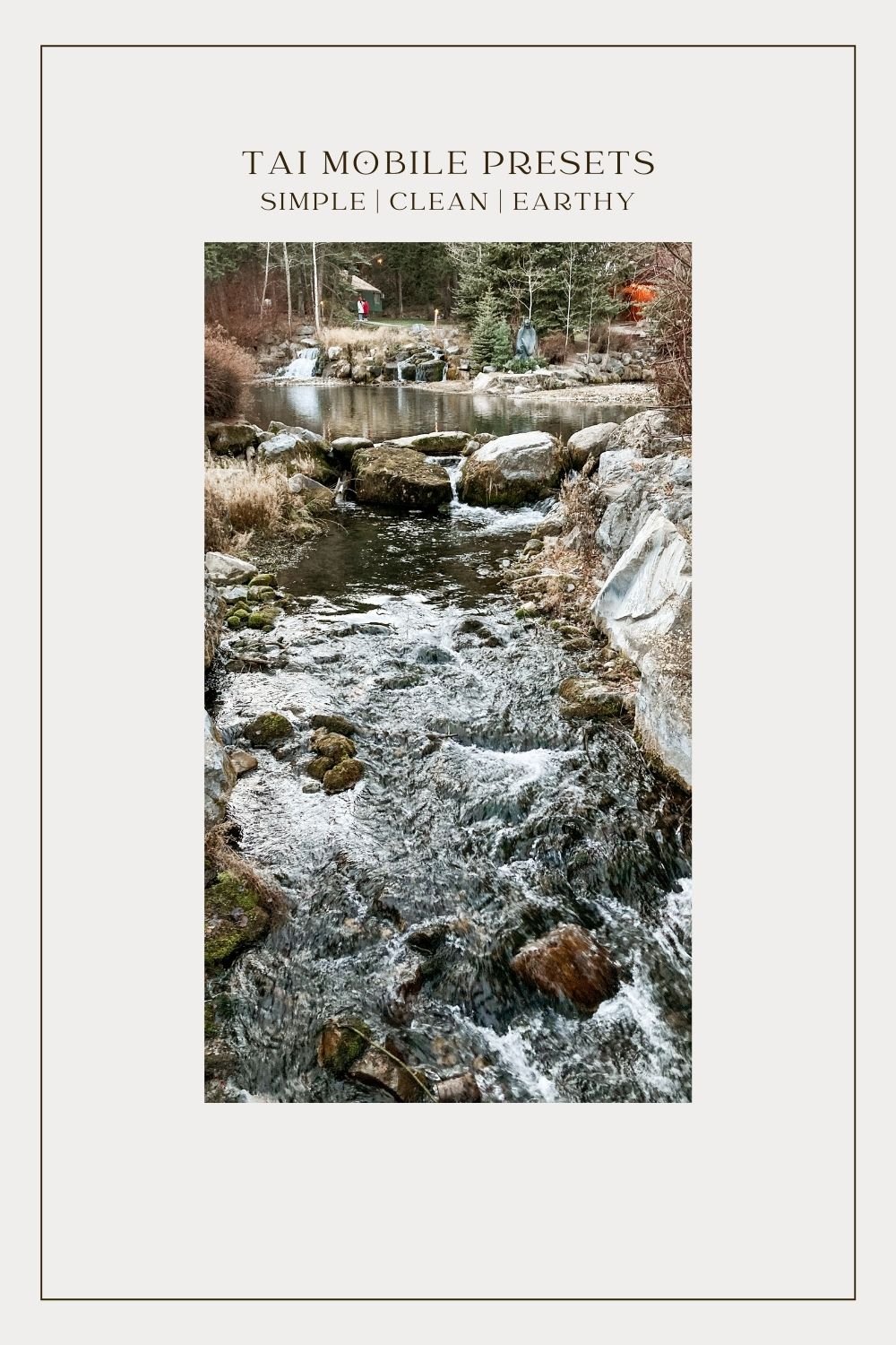 waterfall river with large rocks on the bank