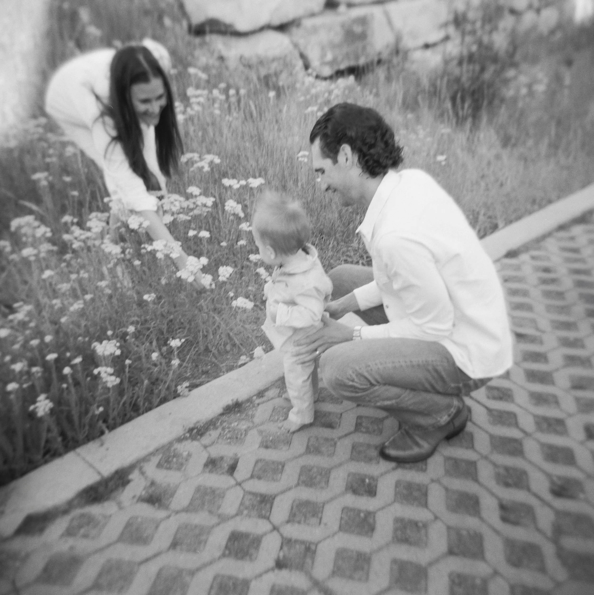 black and white family film photo at the lodge at blue sky park city utah