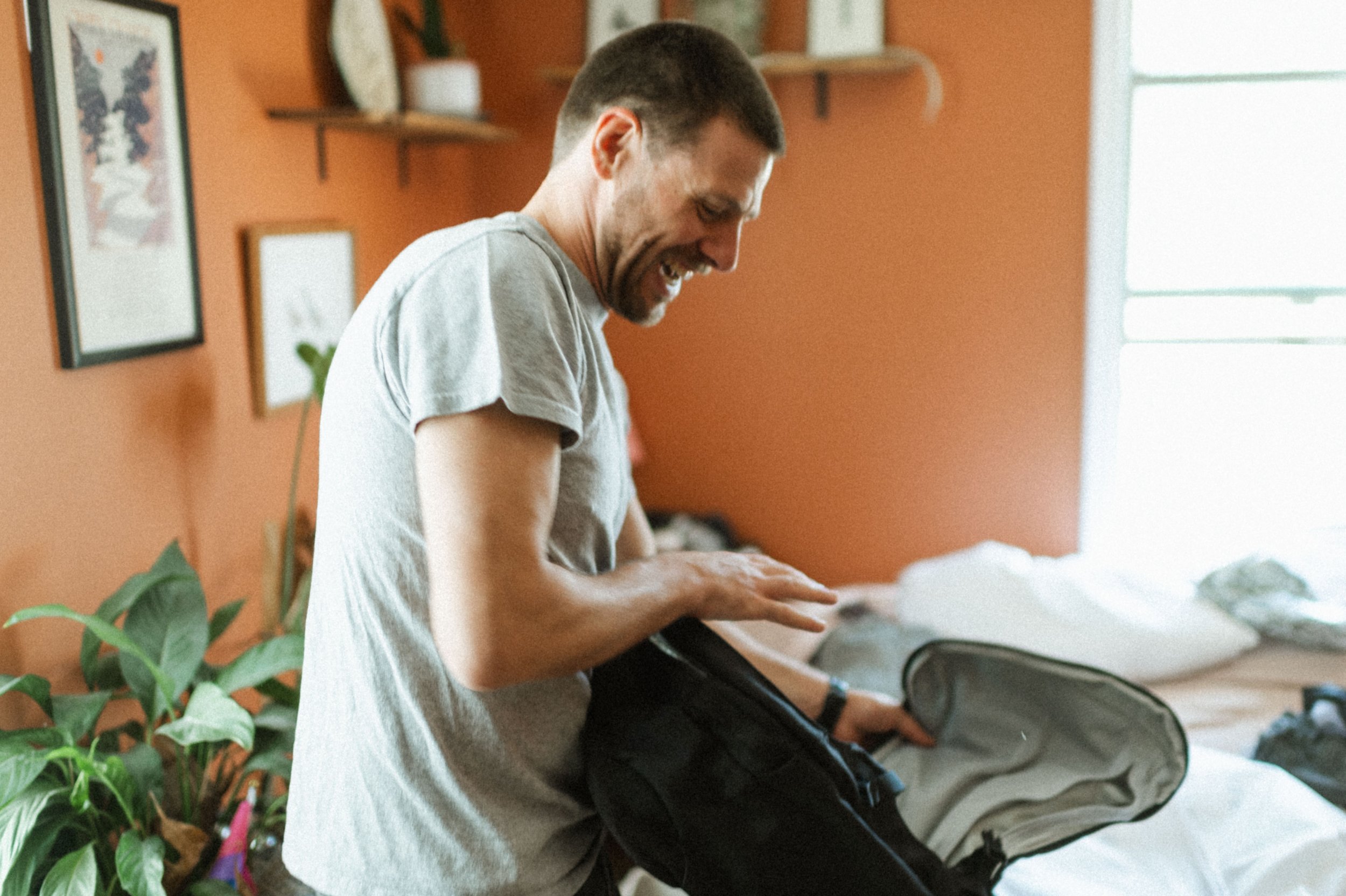 Groom getting ready in artsy, eclectic home ahead of downtown Salt Lake City wedding