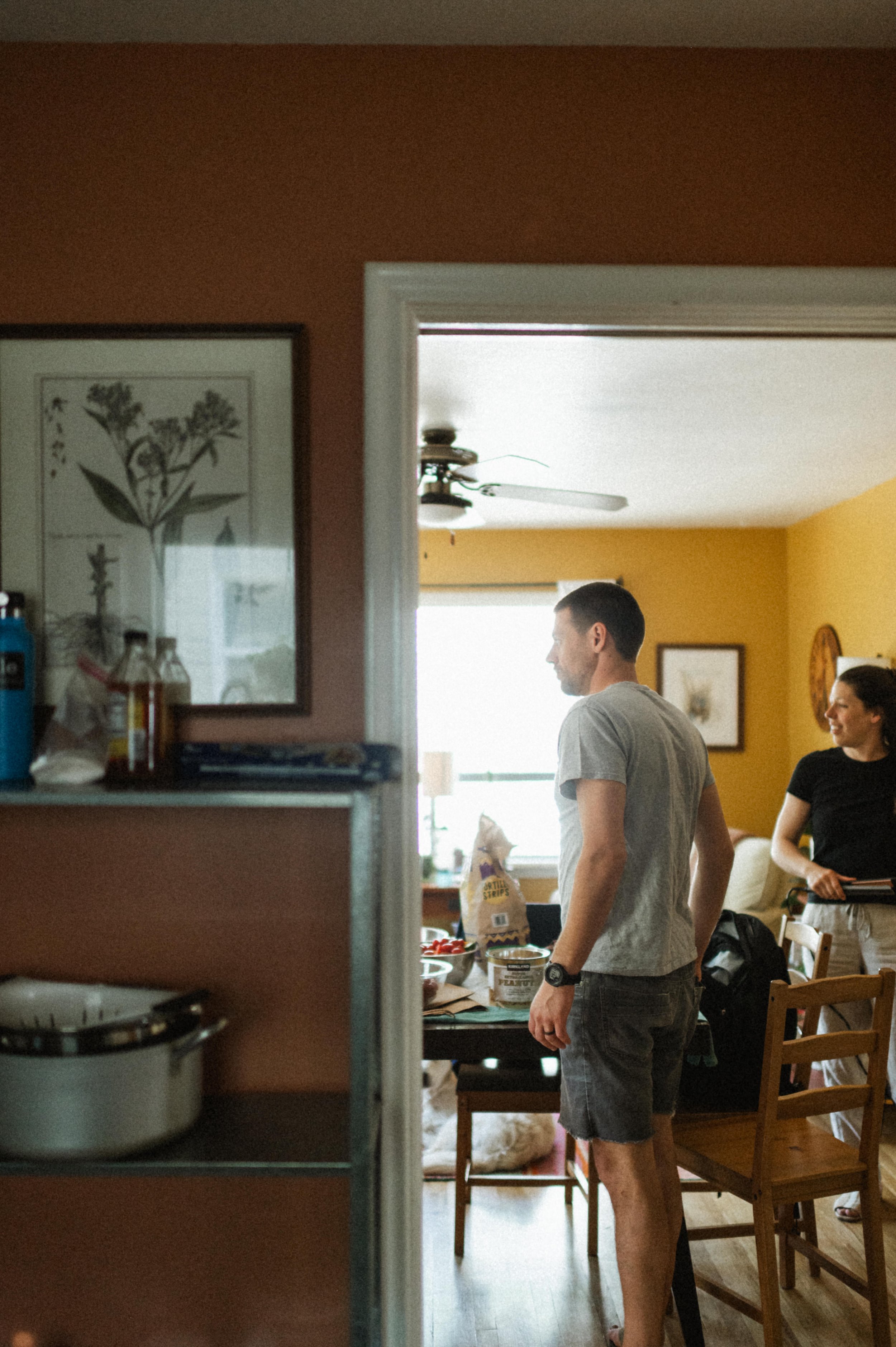 Groom getting ready in artsy, eclectic home ahead of downtown Salt Lake City wedding