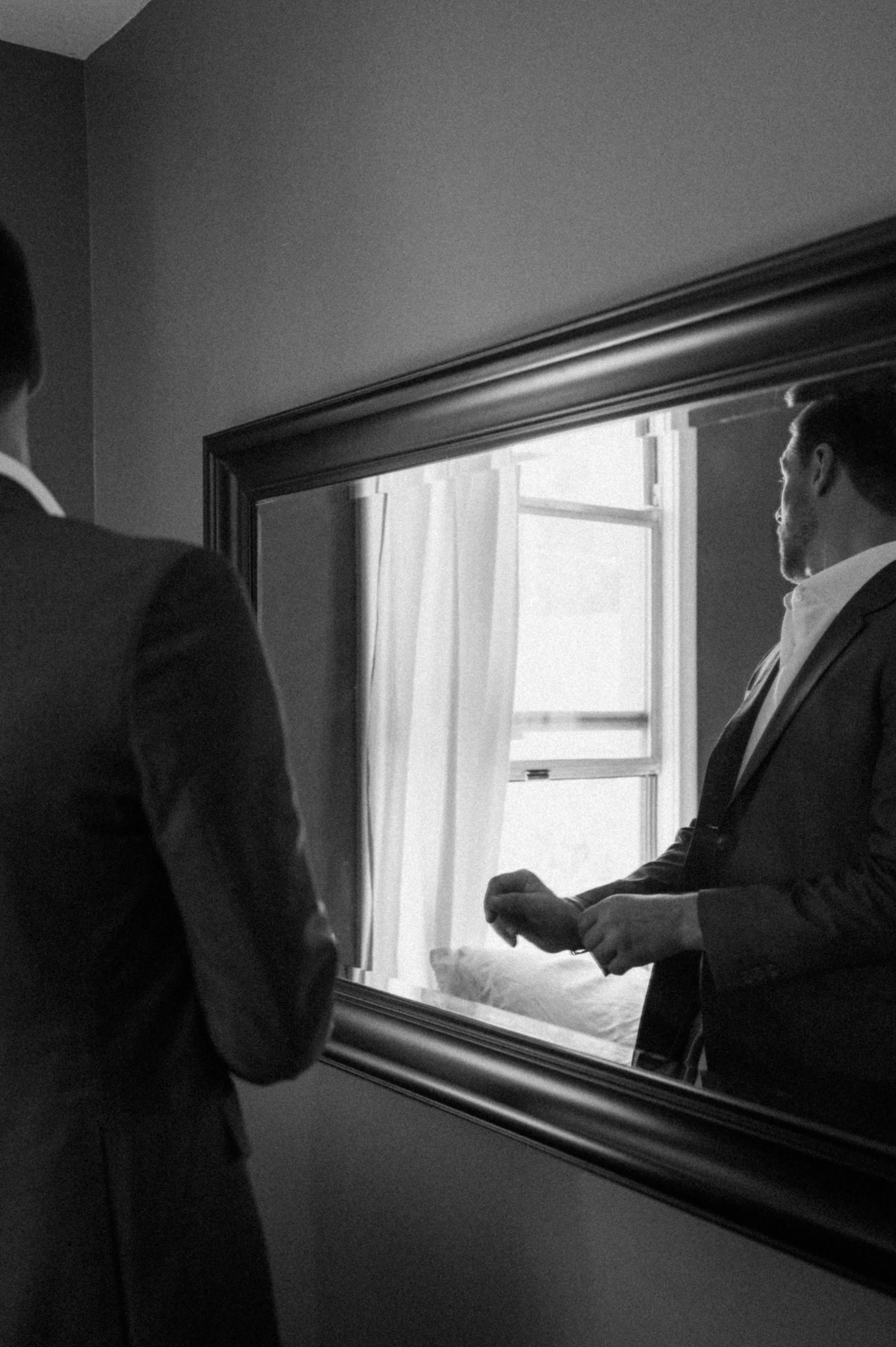 Groom getting ready in artsy, eclectic home ahead of downtown Salt Lake City wedding