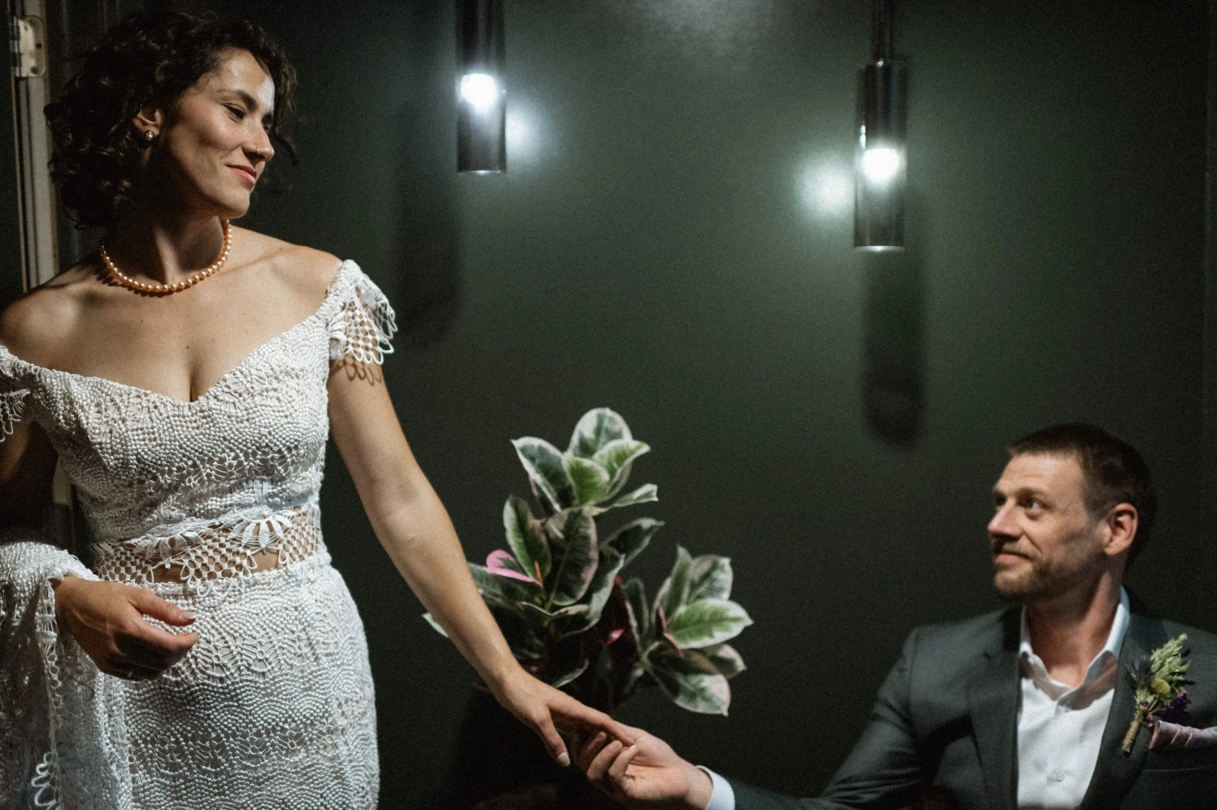 Modern art deco-inspired couple portrait inside Ember's eclectic industrial venue
