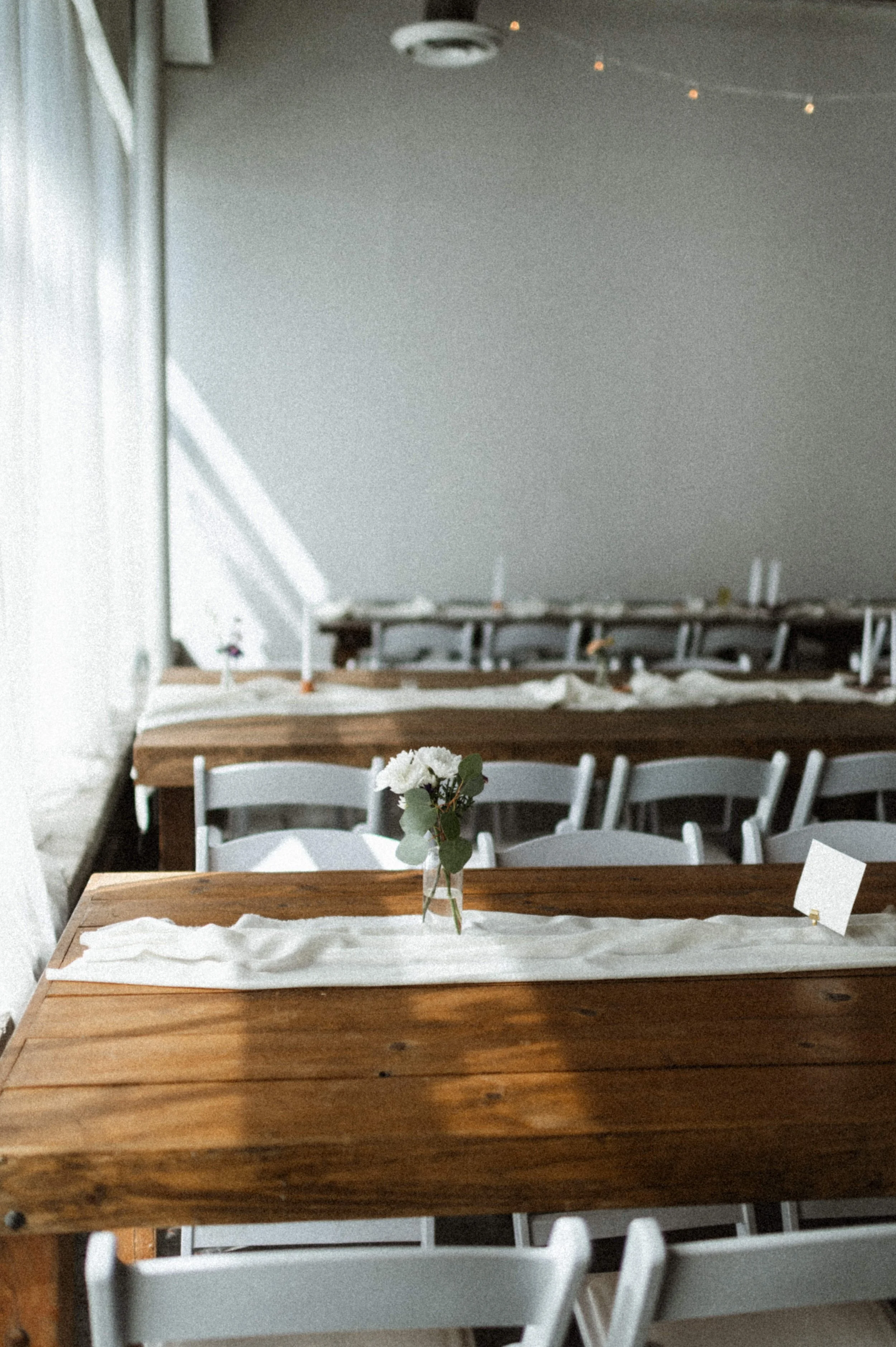 modern industrial wedding venue downtown salt lake city utah wooden table with florals