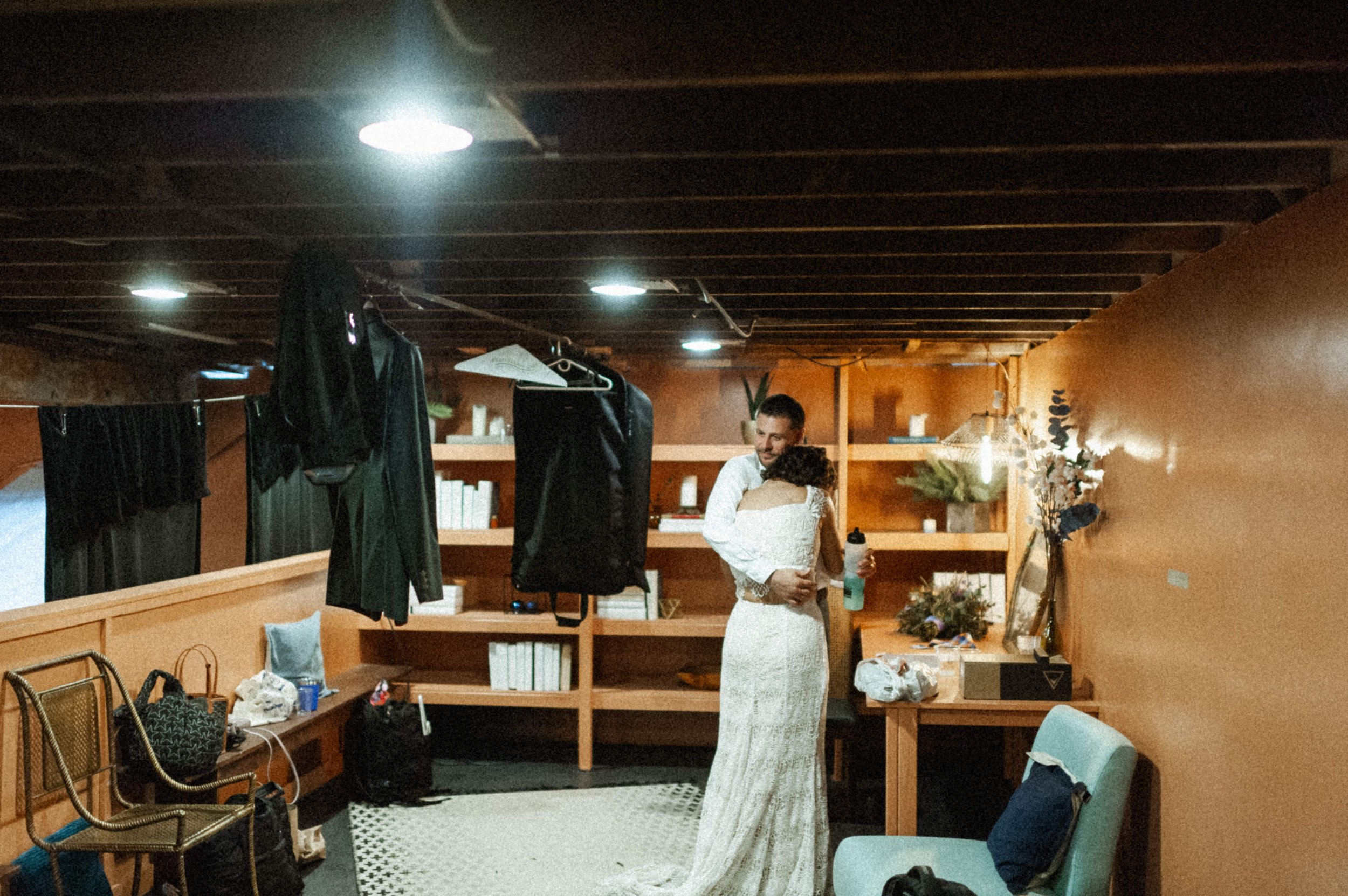 Art deco reception decor against raw brick walls at Ember wedding venue