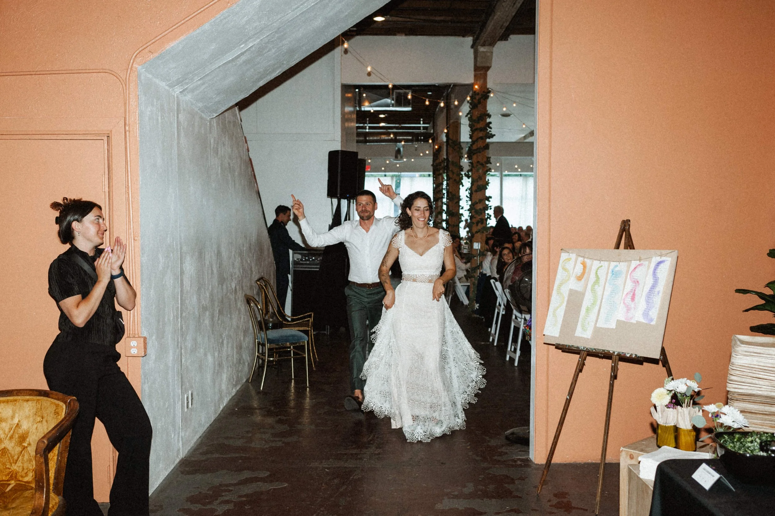 Art deco reception decor against raw brick walls at Ember wedding venue