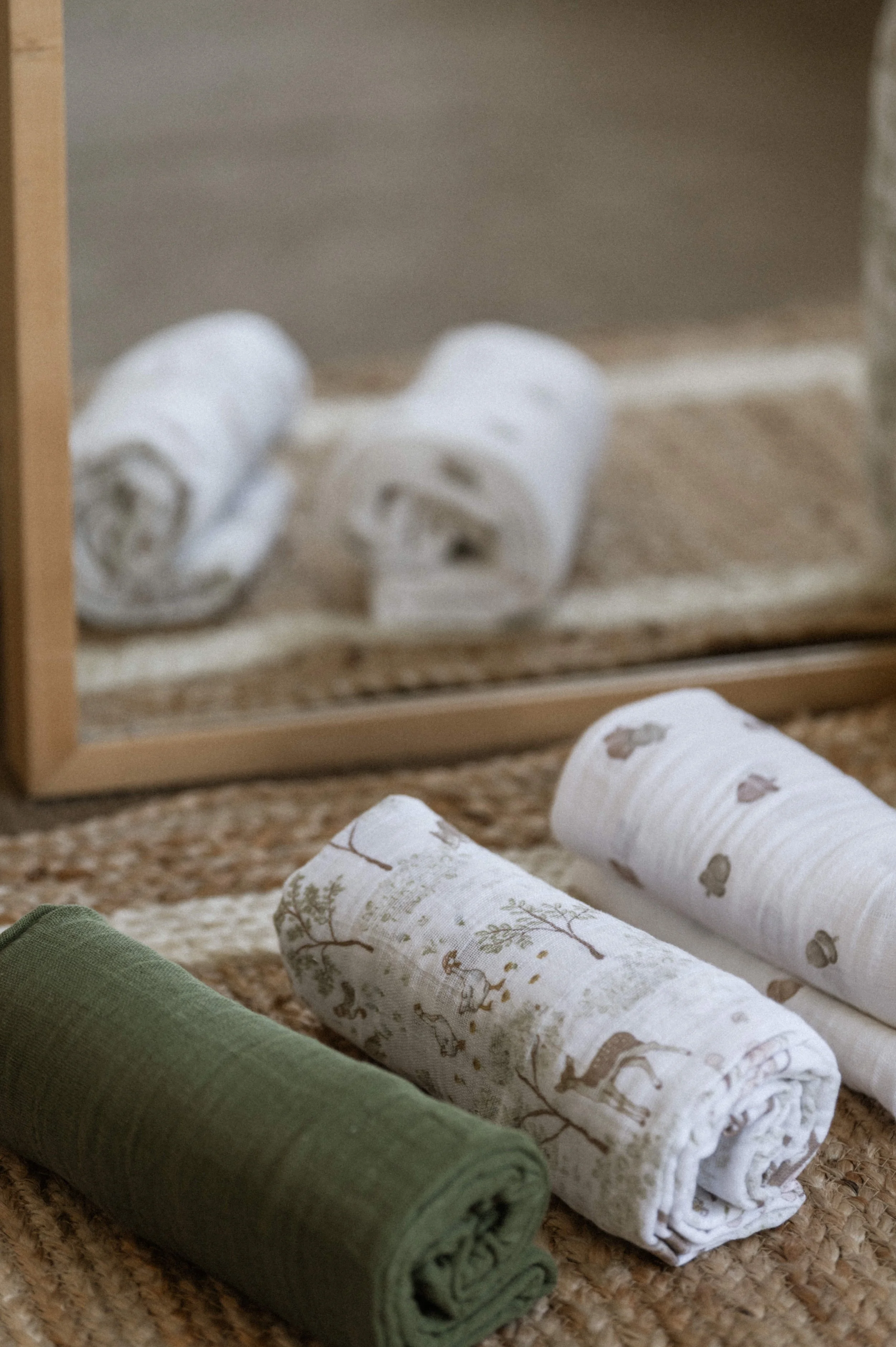Lifestyle product photography of organic cotton quilt woven rug, boho nursery styling