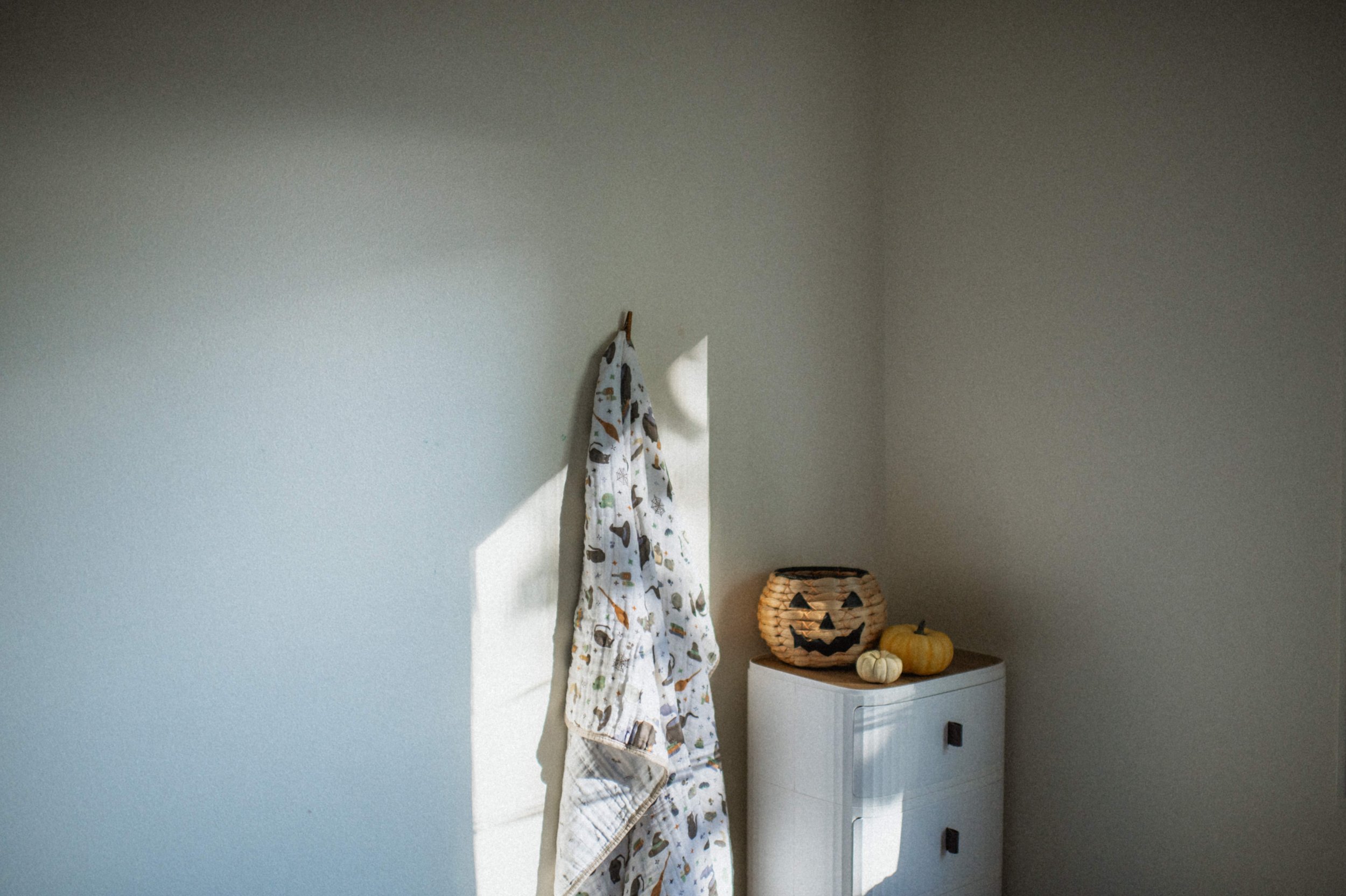 Professional product photography of organic cotton muslin Halloween print quilt