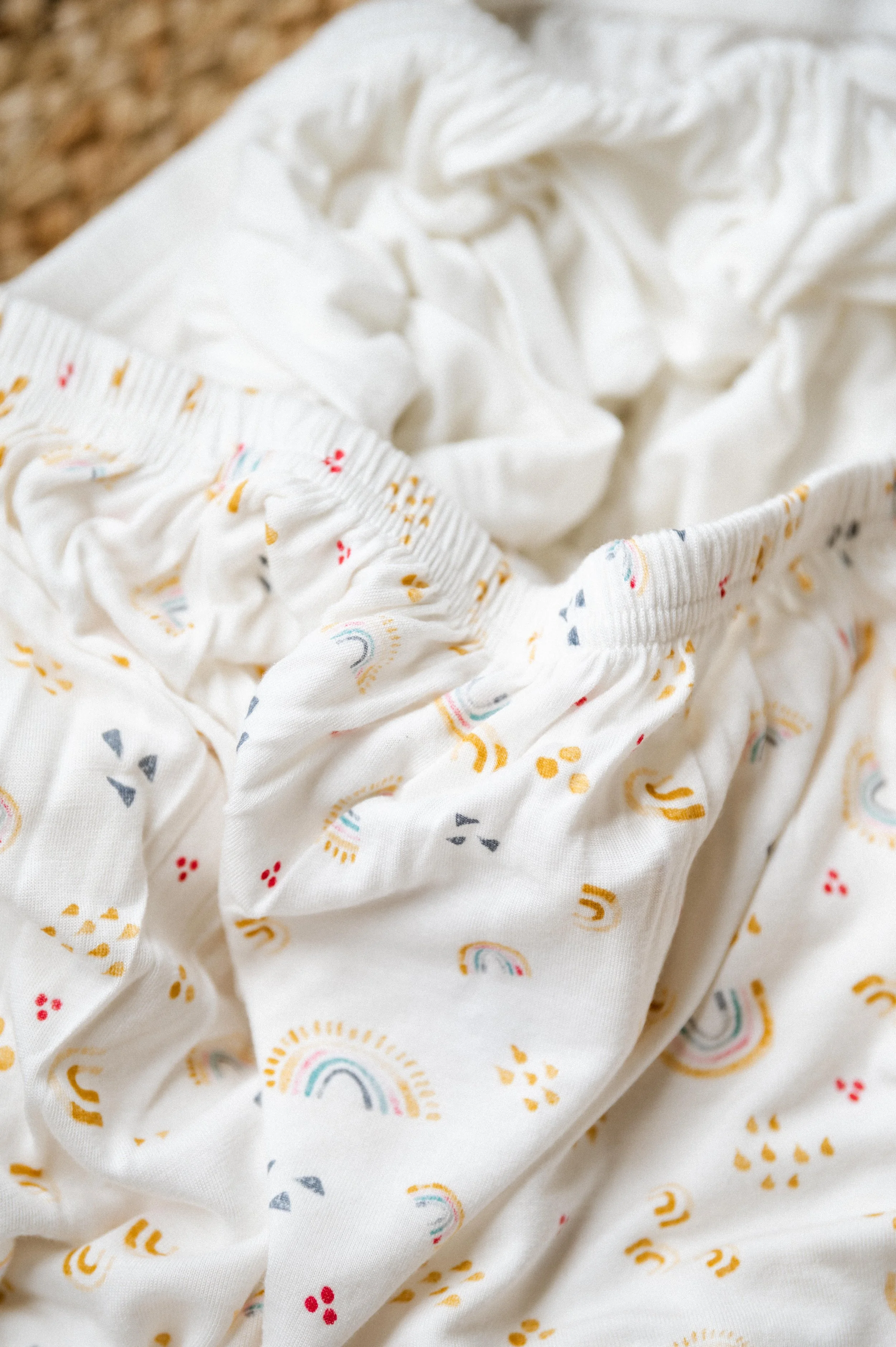 simple minimalistic product photography baby crib sheet