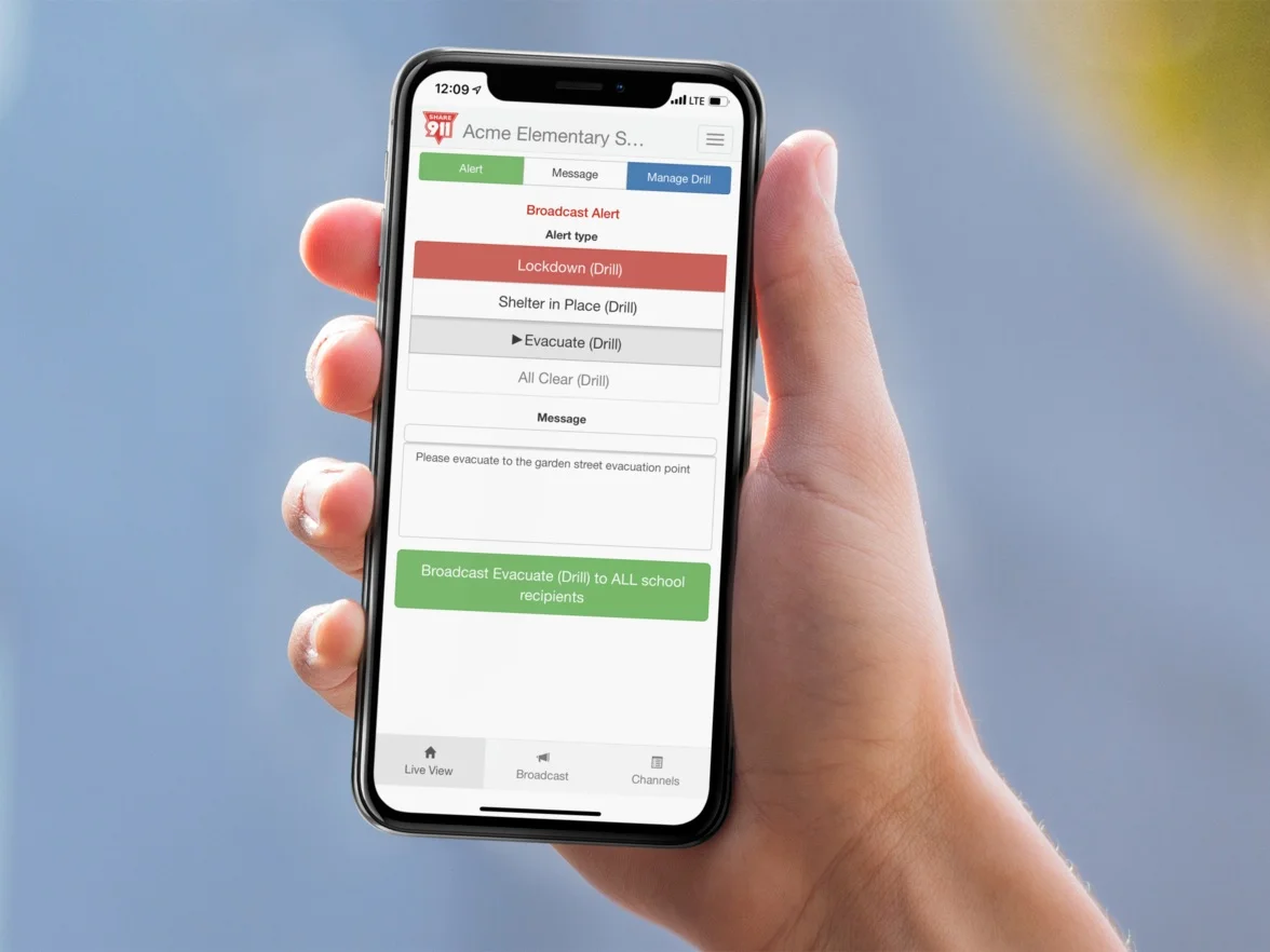 man-holding-an-iphone-x-mockup-against-a-blurry-building-a17681+%286%29.jpg