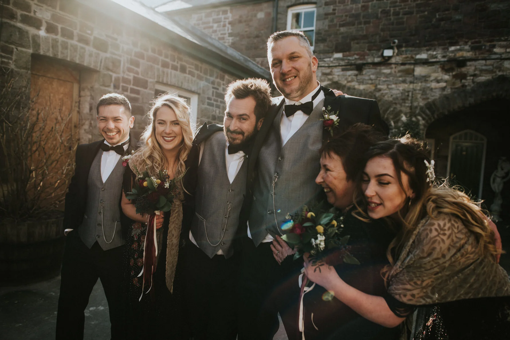 Wedding Photojournalism - A groom with his family