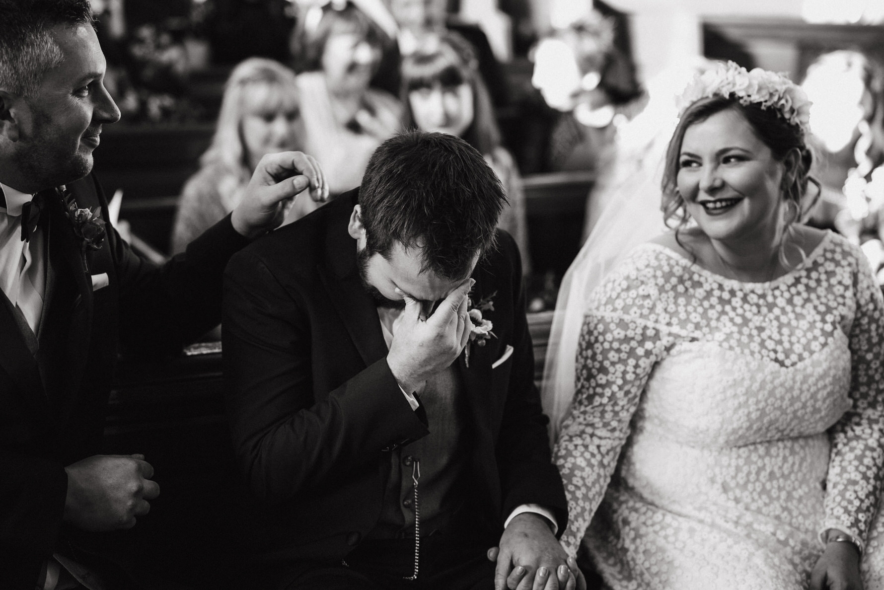 Wedding Photojournalism - A groom in tears at the wedding ceremony