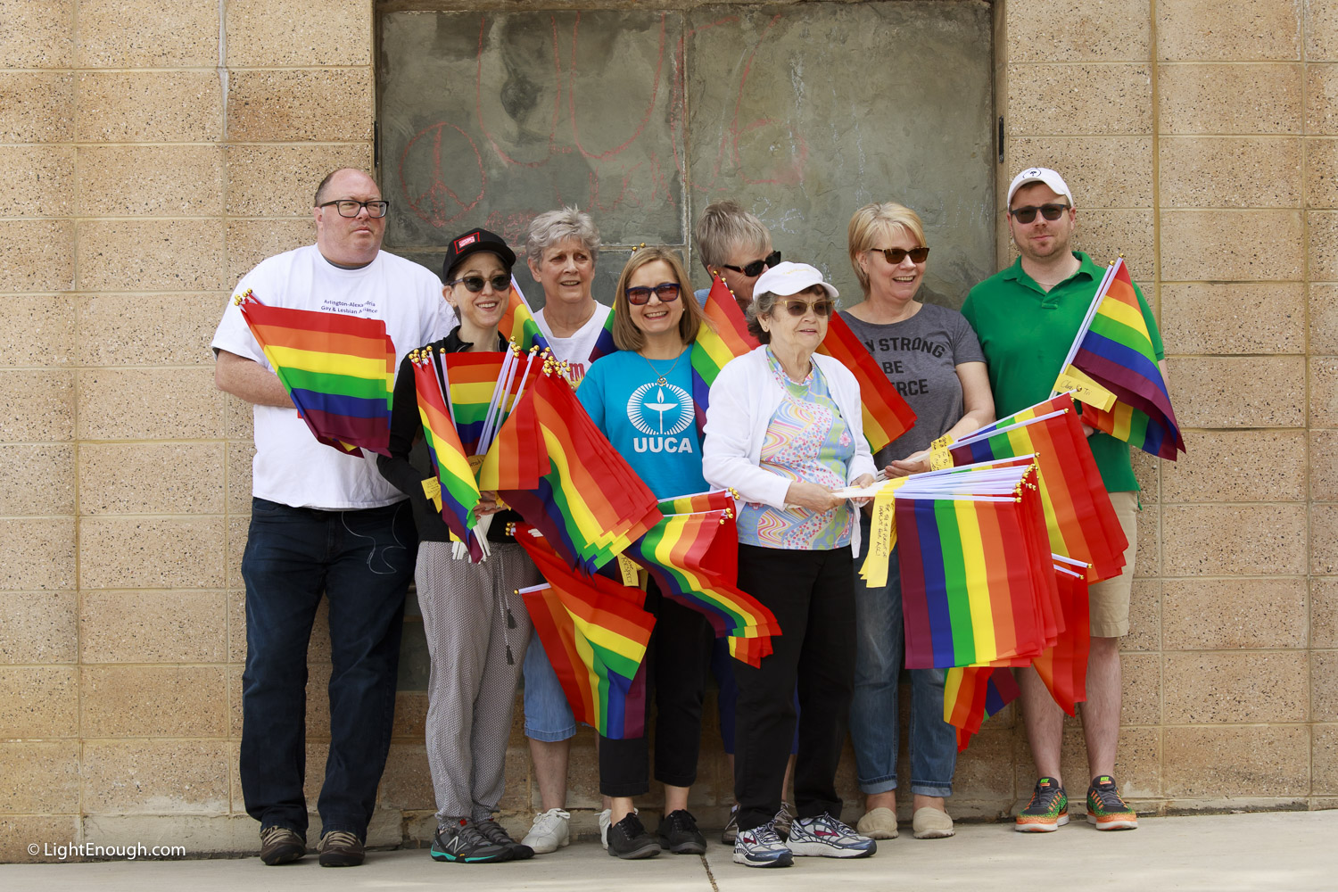  UUCA members prepare to plant Pride Flags at Pride Flag day on Saturday June 3, 2017. Photo by John St Hilaire/LightEnough.com. 